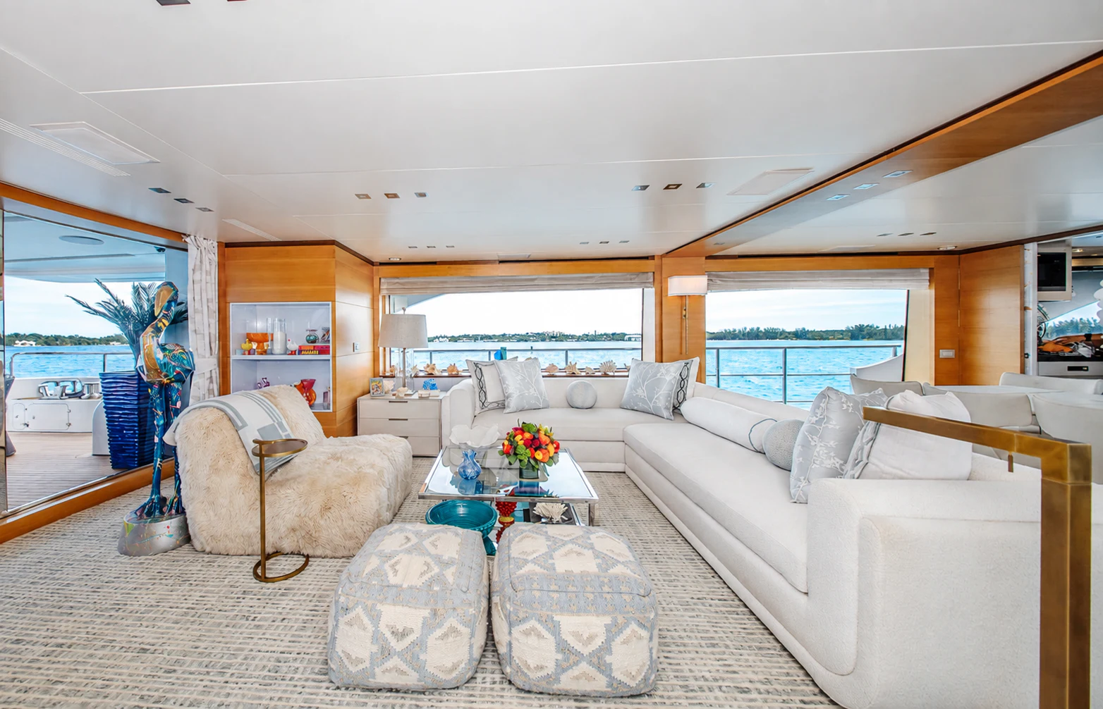 a living room with a large window aboard REHAB Yacht for Sale