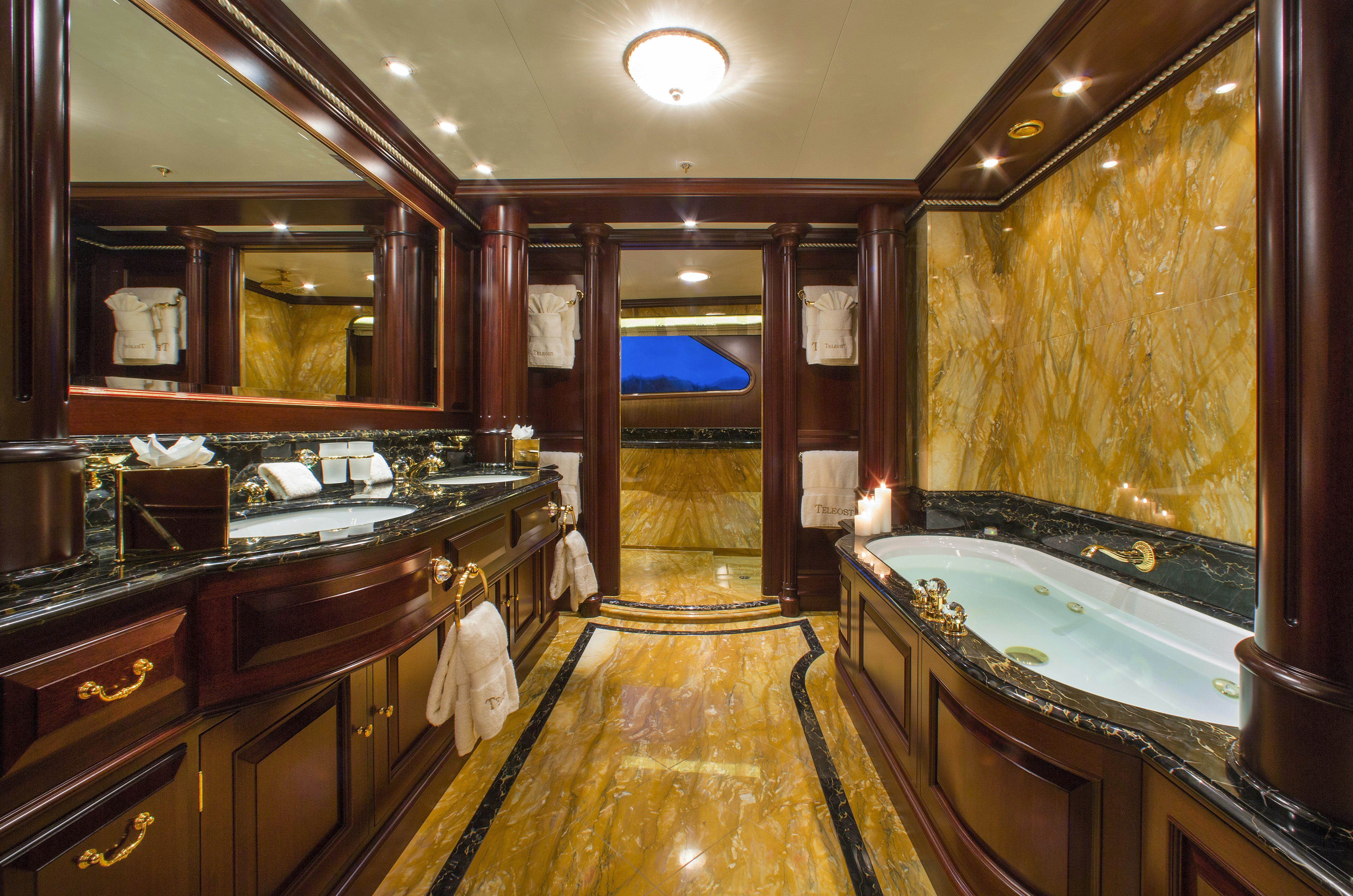 a bathroom with a large tub aboard TELEOST Yacht for Charter