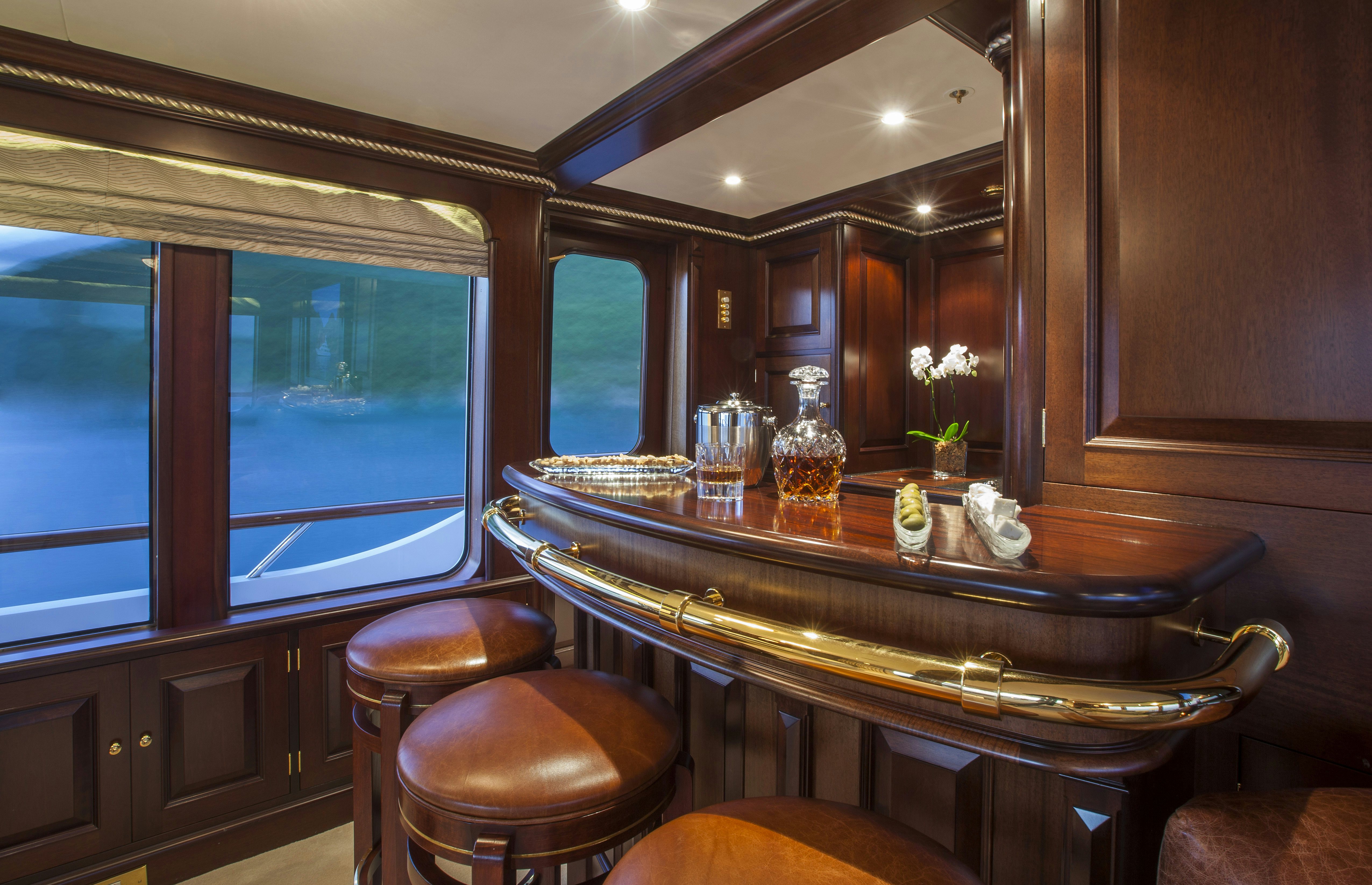 a large kitchen with a large island aboard TELEOST Yacht for Charter