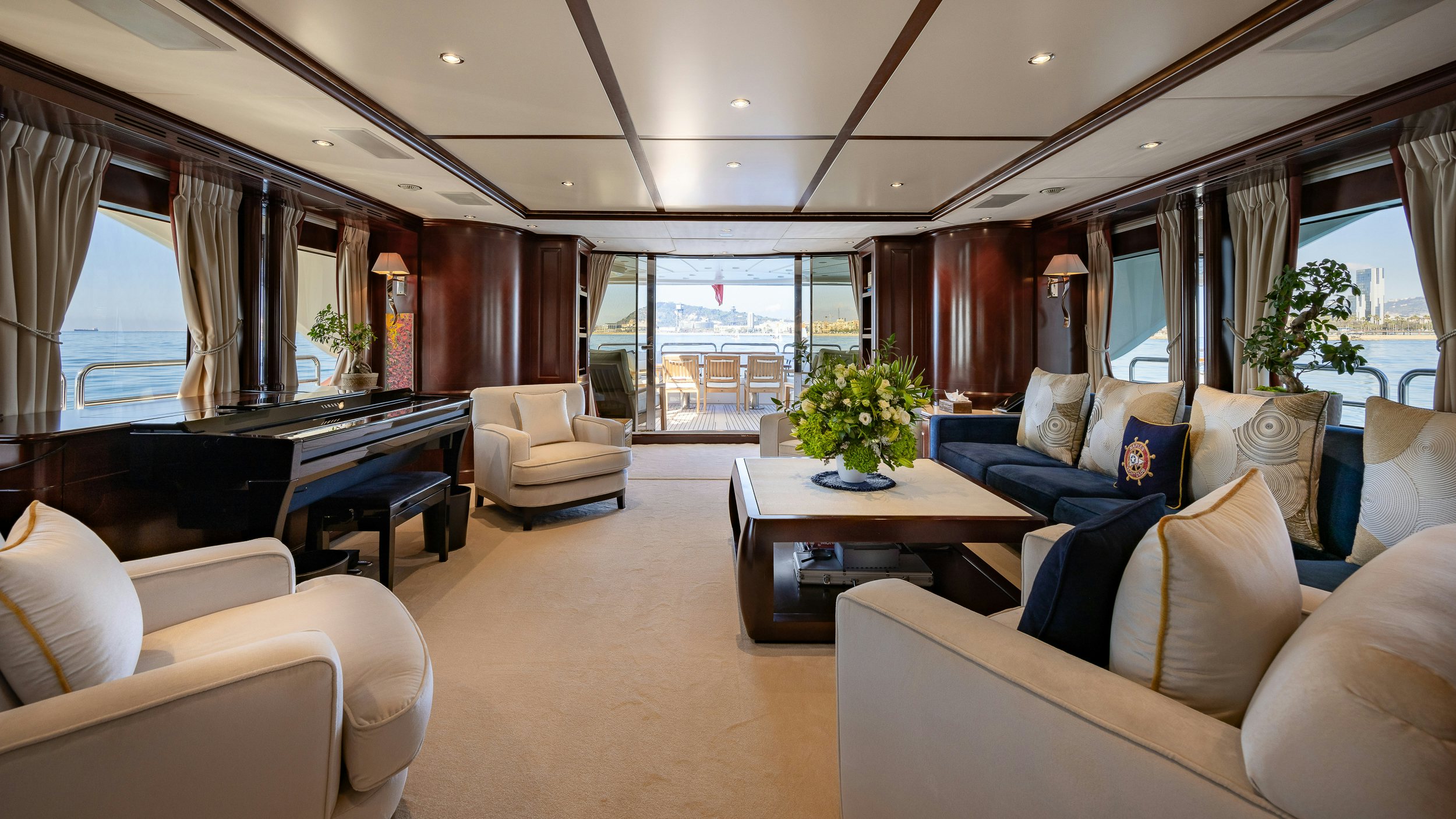 a living room with a large window aboard BUNTY Yacht for Sale