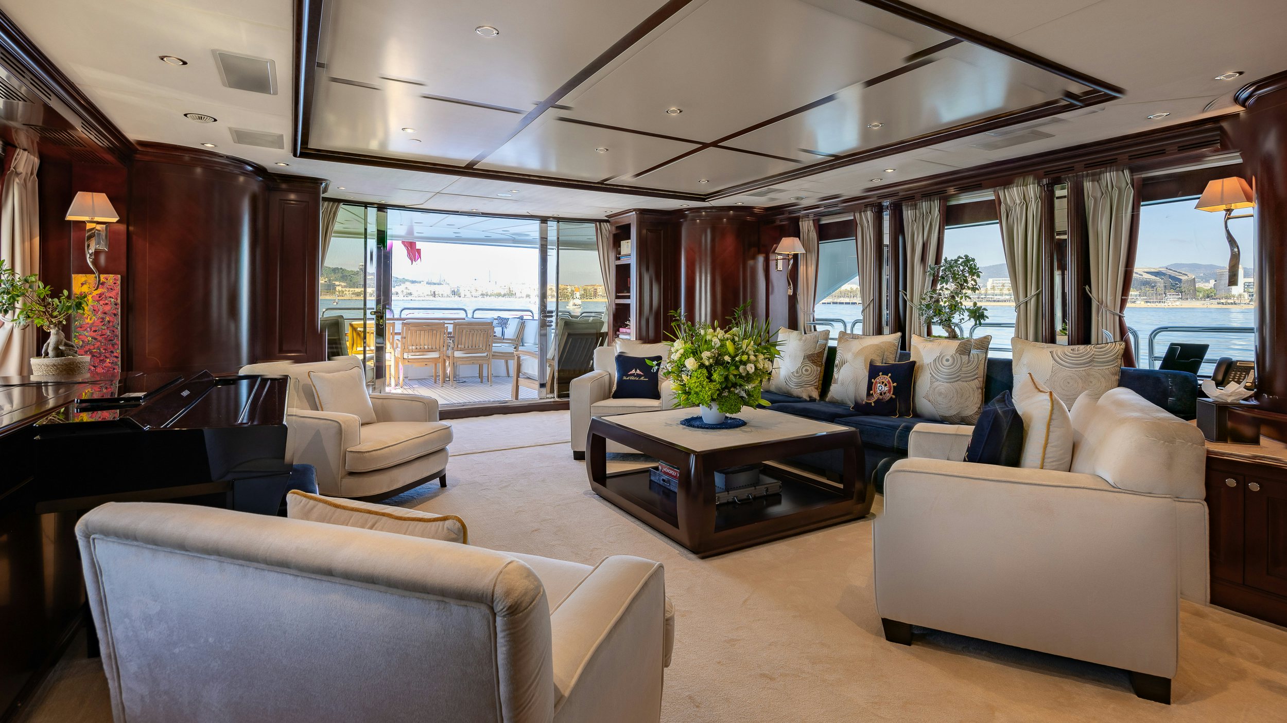 a living room with a large window aboard BUNTY Yacht for Sale
