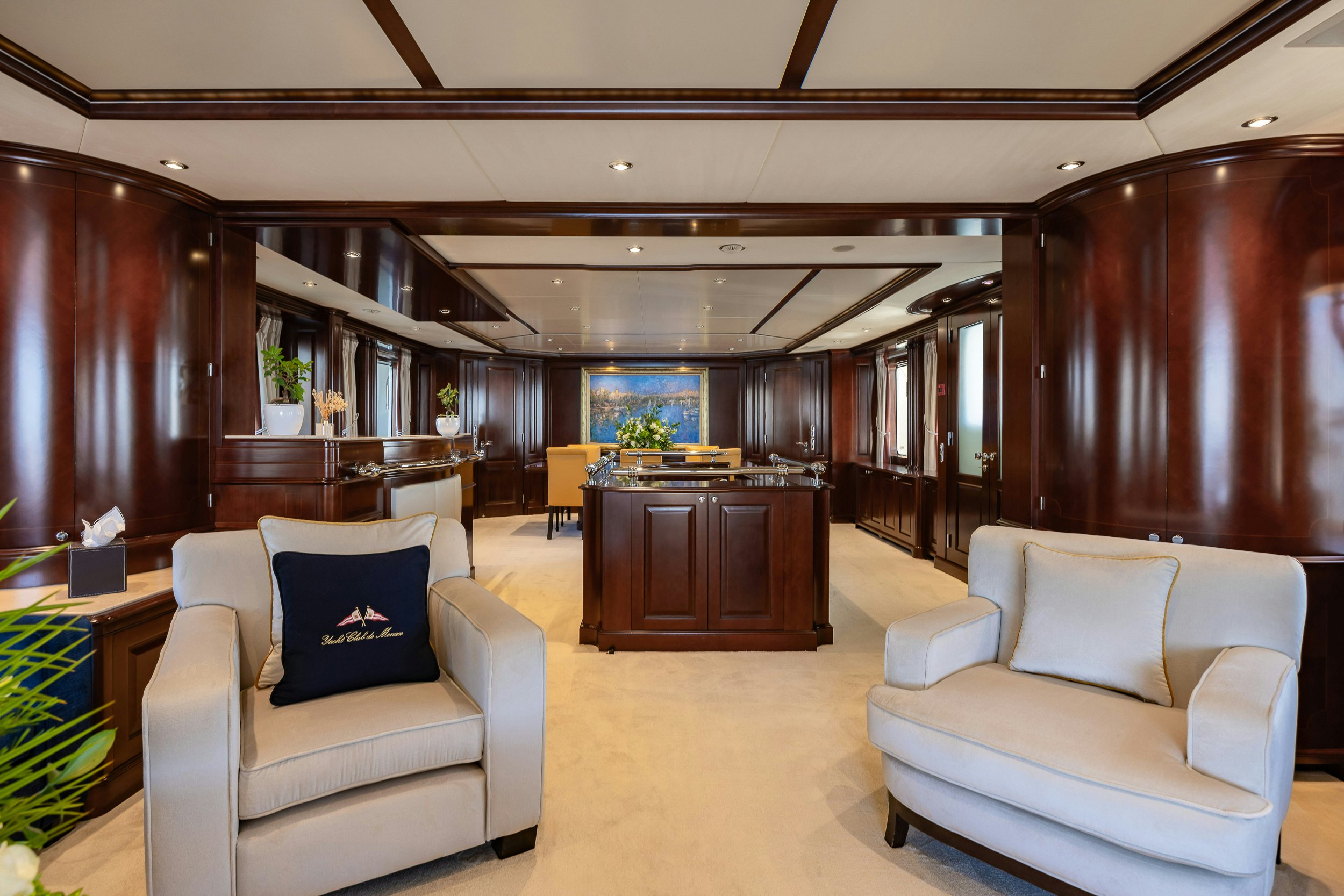 a living room with a couch and a table aboard BUNTY Yacht for Sale
