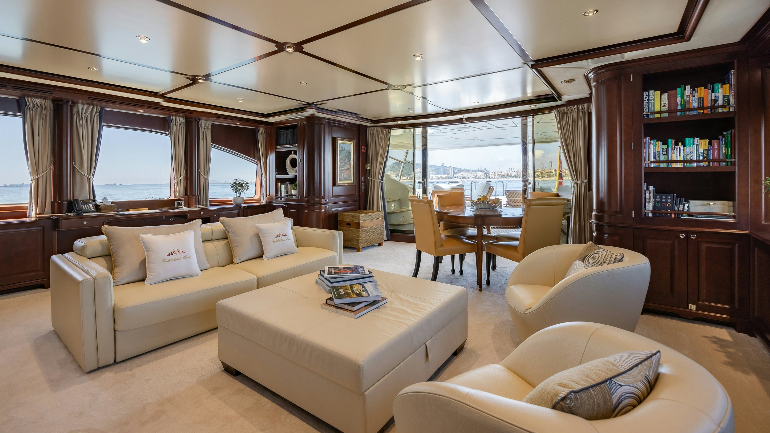 a living room with a couch and a table aboard BUNTY Yacht for Sale