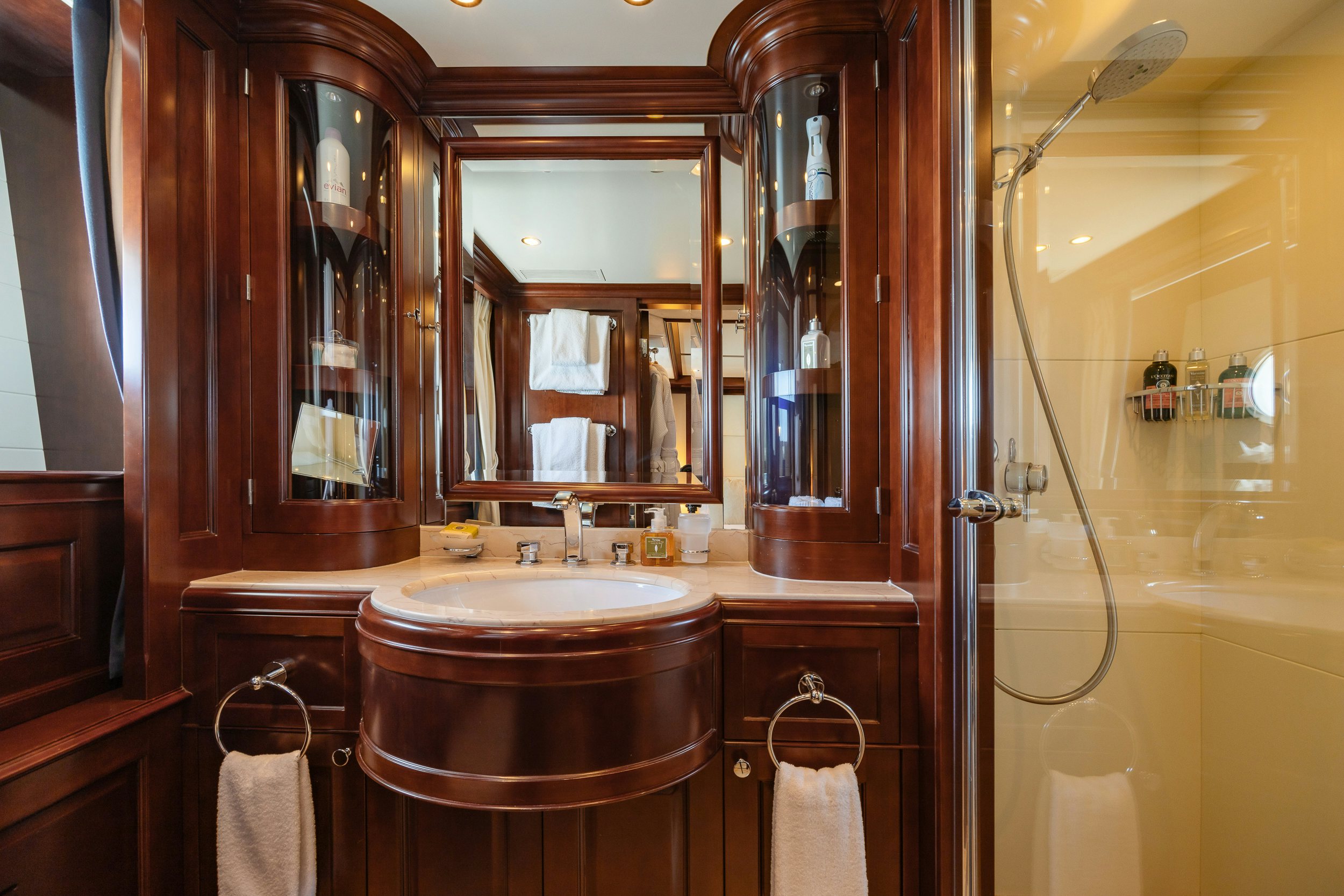 a bathroom with a sink and a mirror aboard BUNTY Yacht for Sale