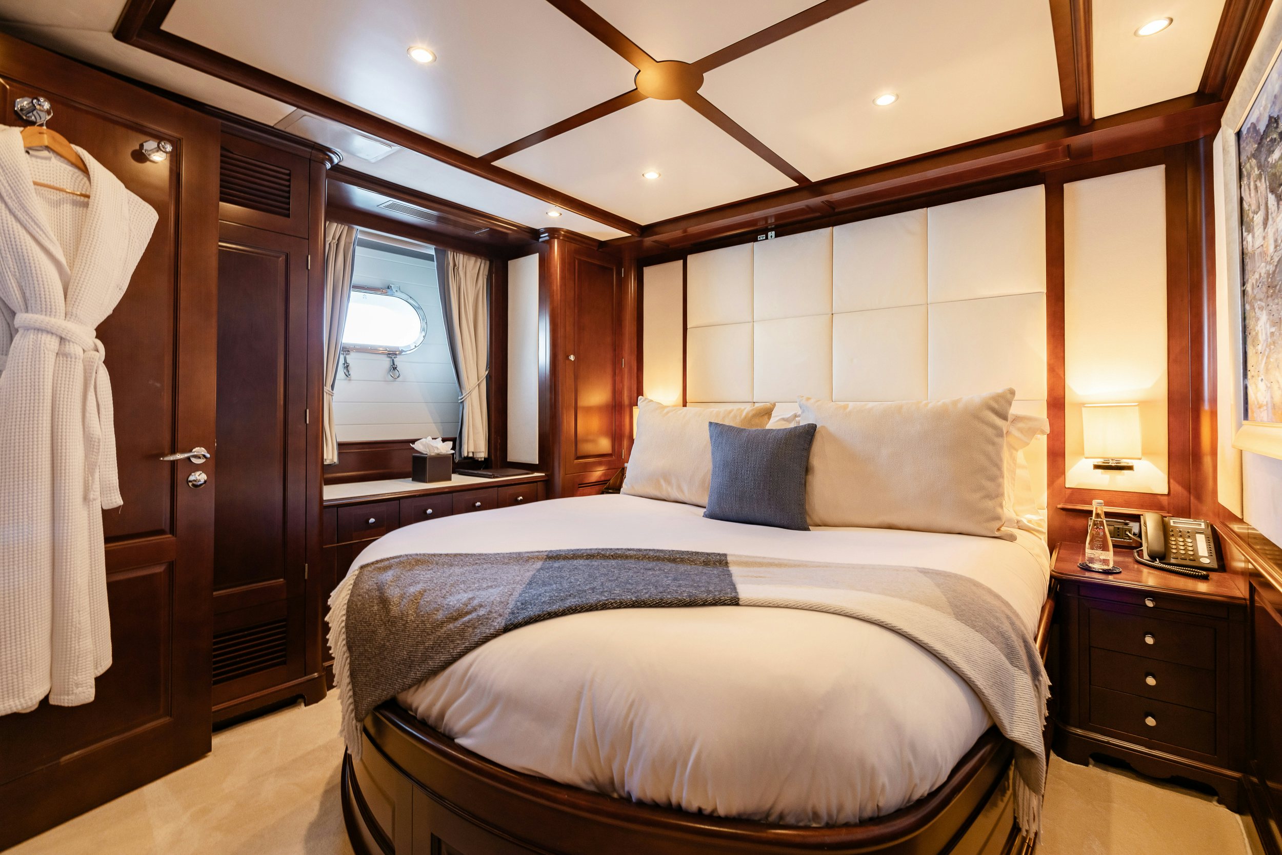 a bed in a room aboard BUNTY Yacht for Sale