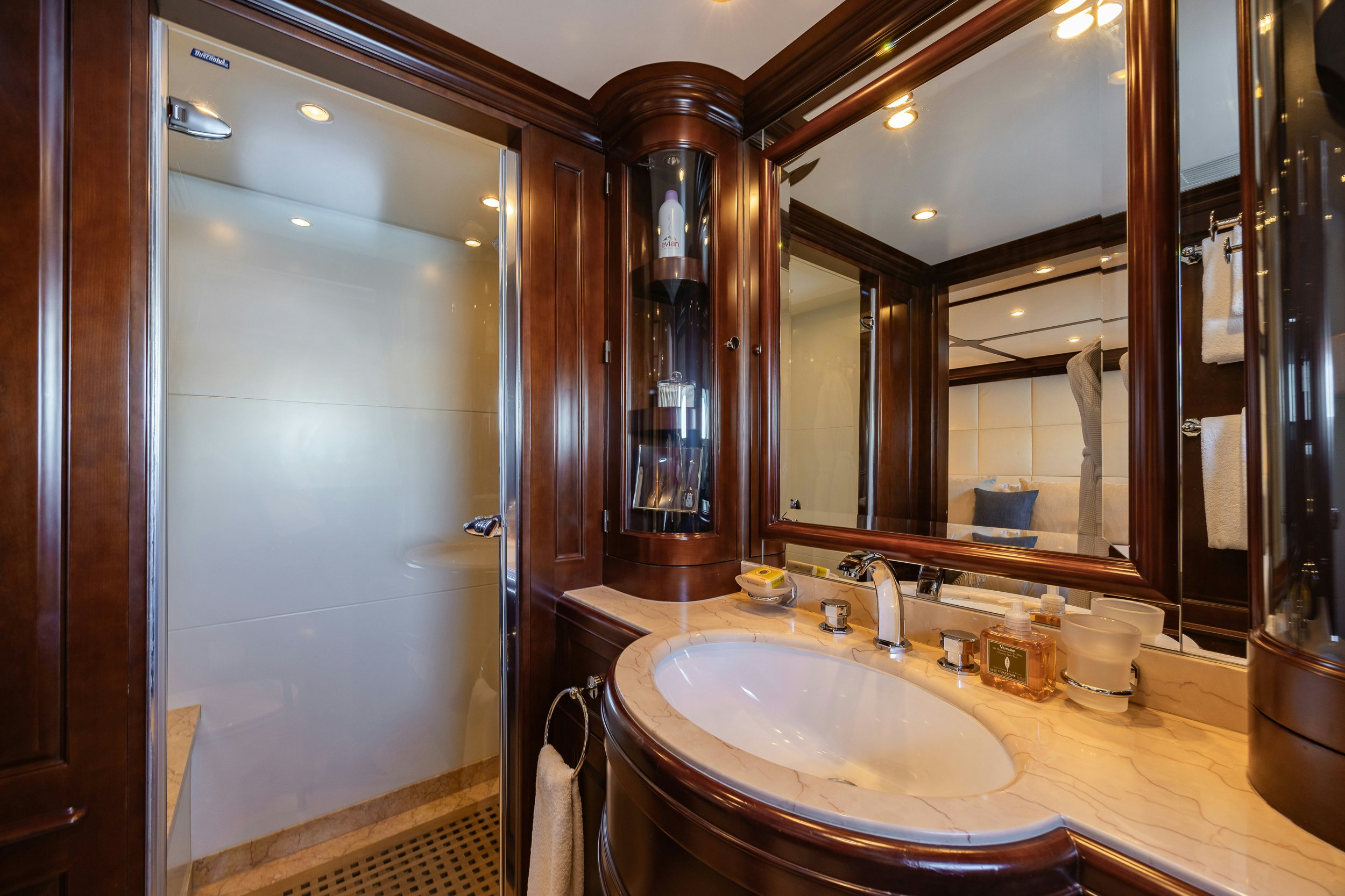 a bathroom with a large mirror aboard BUNTY Yacht for Sale