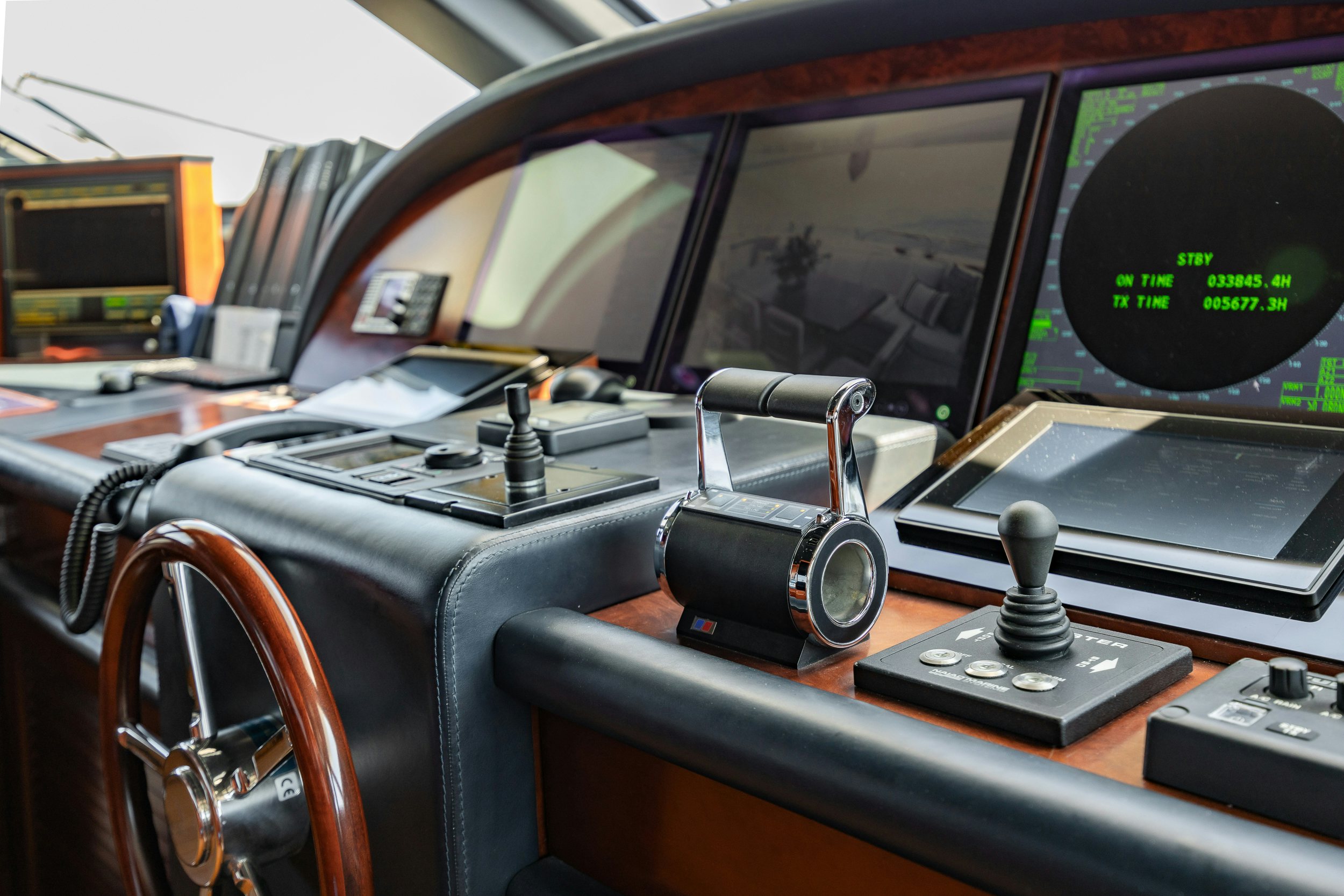 a car with a steering wheel and dashboard aboard BUNTY Yacht for Sale