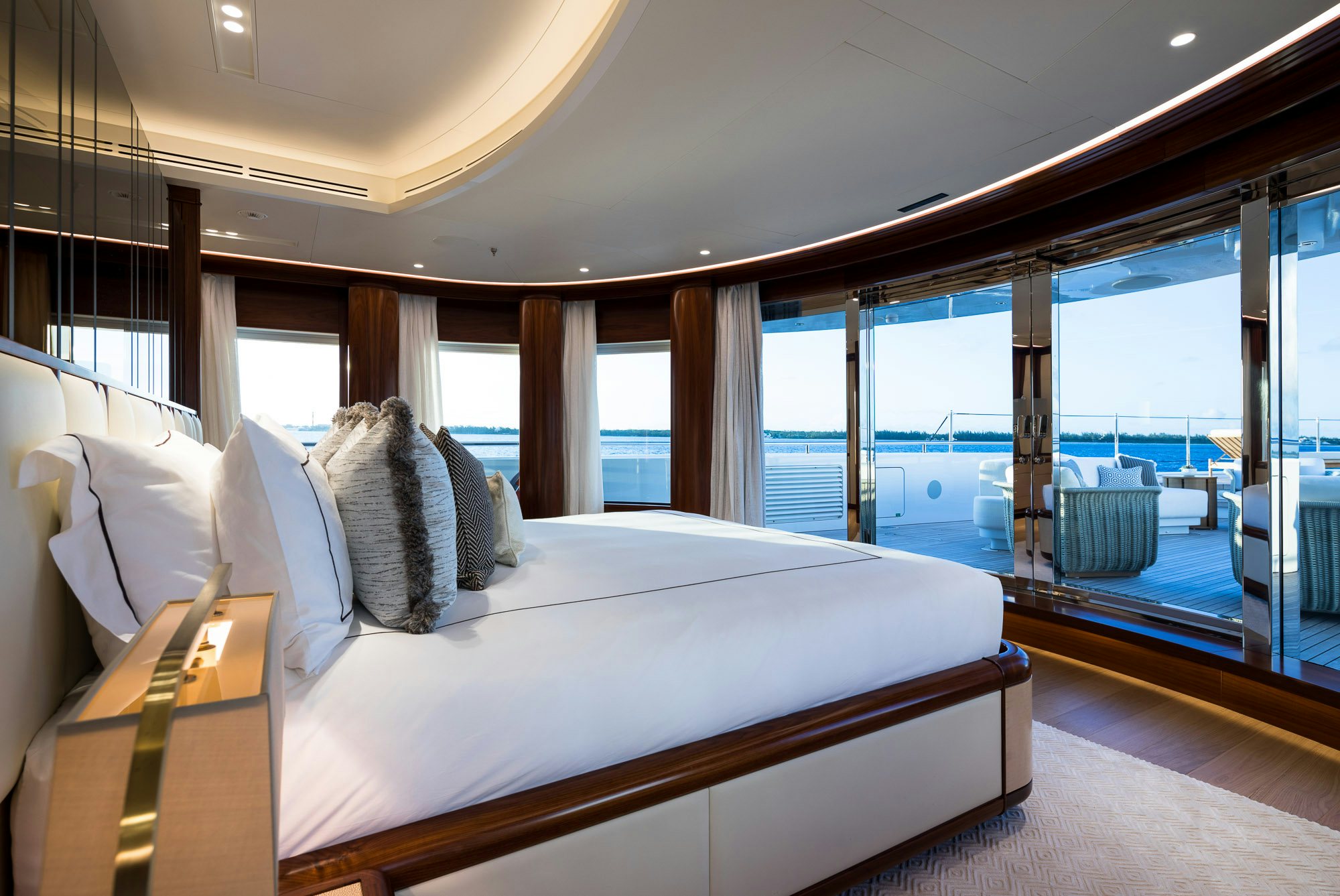 a bed in a room aboard CALEX Yacht for Charter