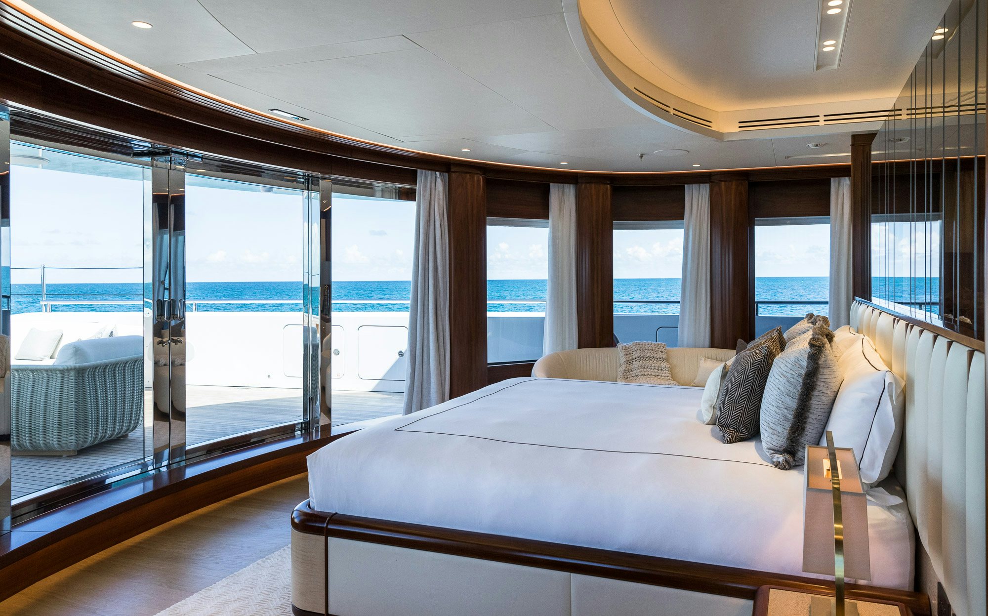 a bed in a room aboard CALEX Yacht for Charter