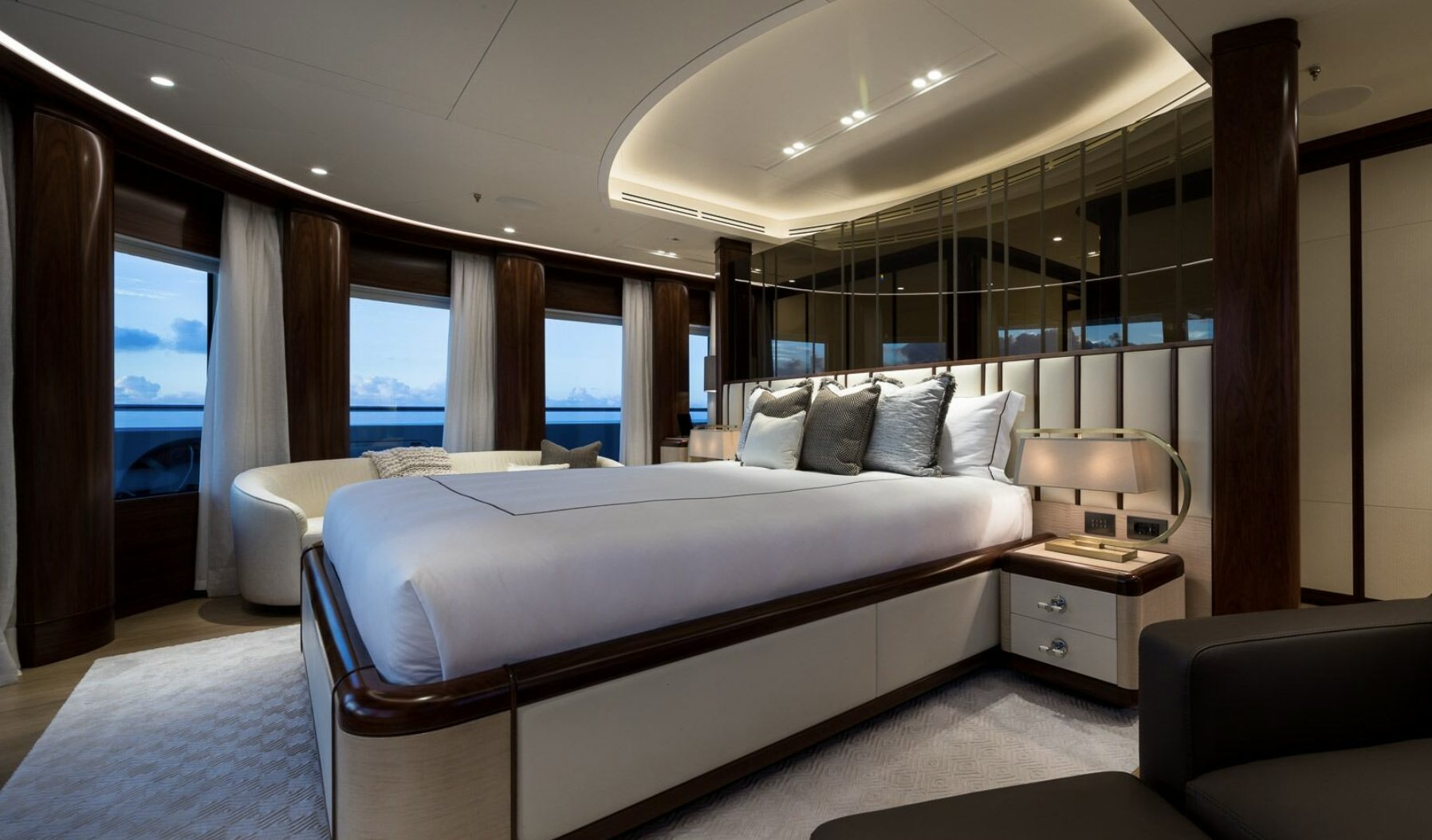 a bed in a room aboard CALEX Yacht for Charter