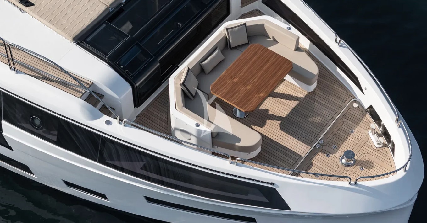 the interior of a white car aboard THEOTOKOS VI Yacht for Charter