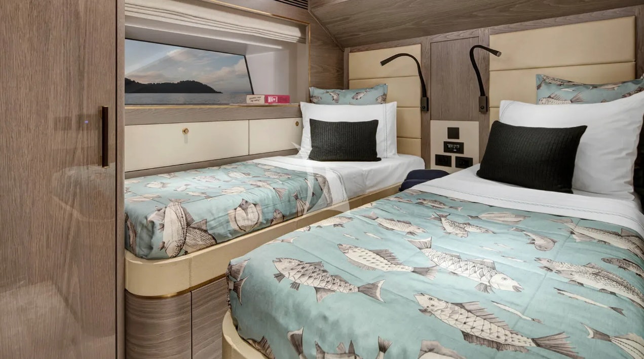 a couple of beds in a room aboard THEOTOKOS VI Yacht for Charter