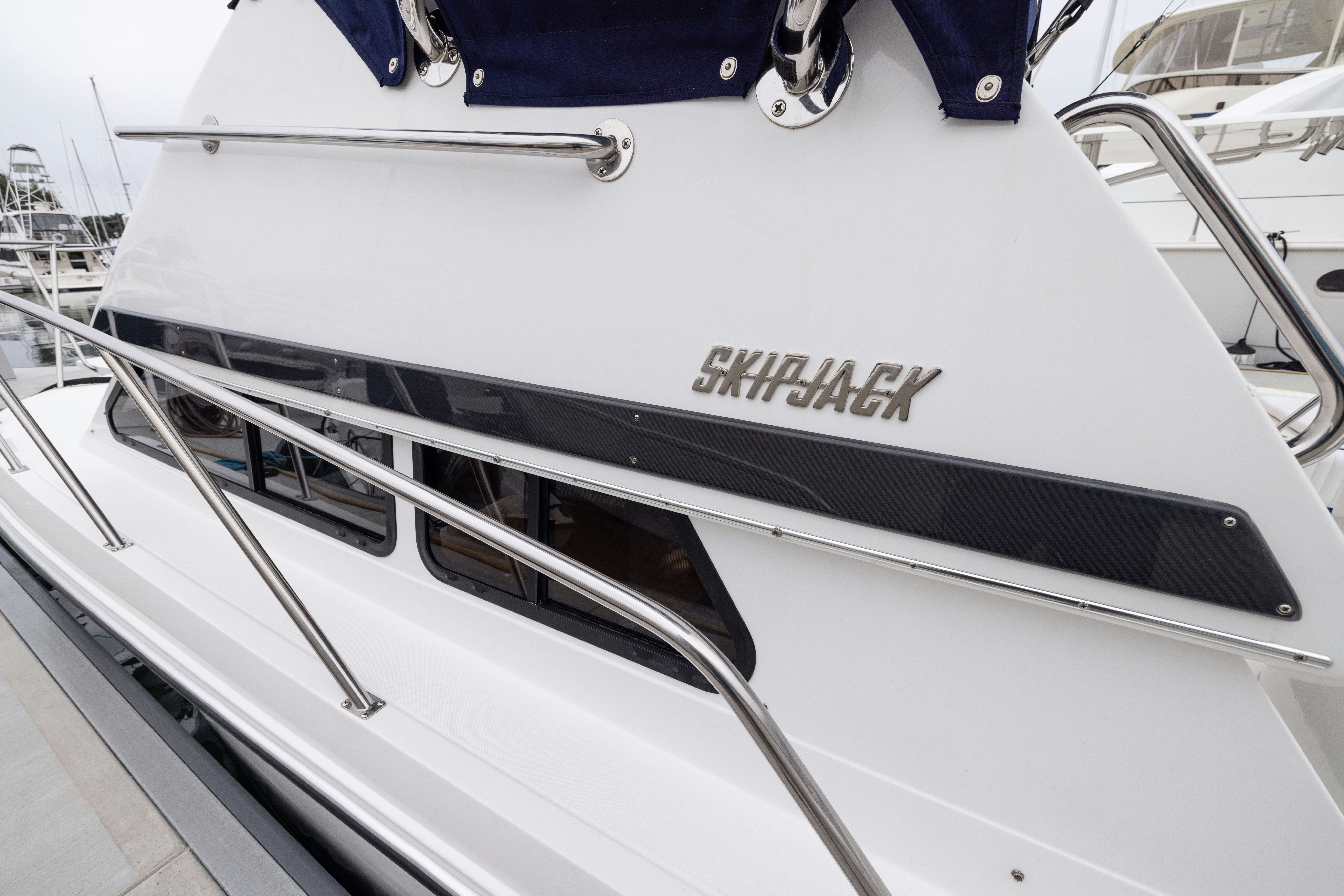 the front of a white boat aboard 5TH KID Yacht for Sale