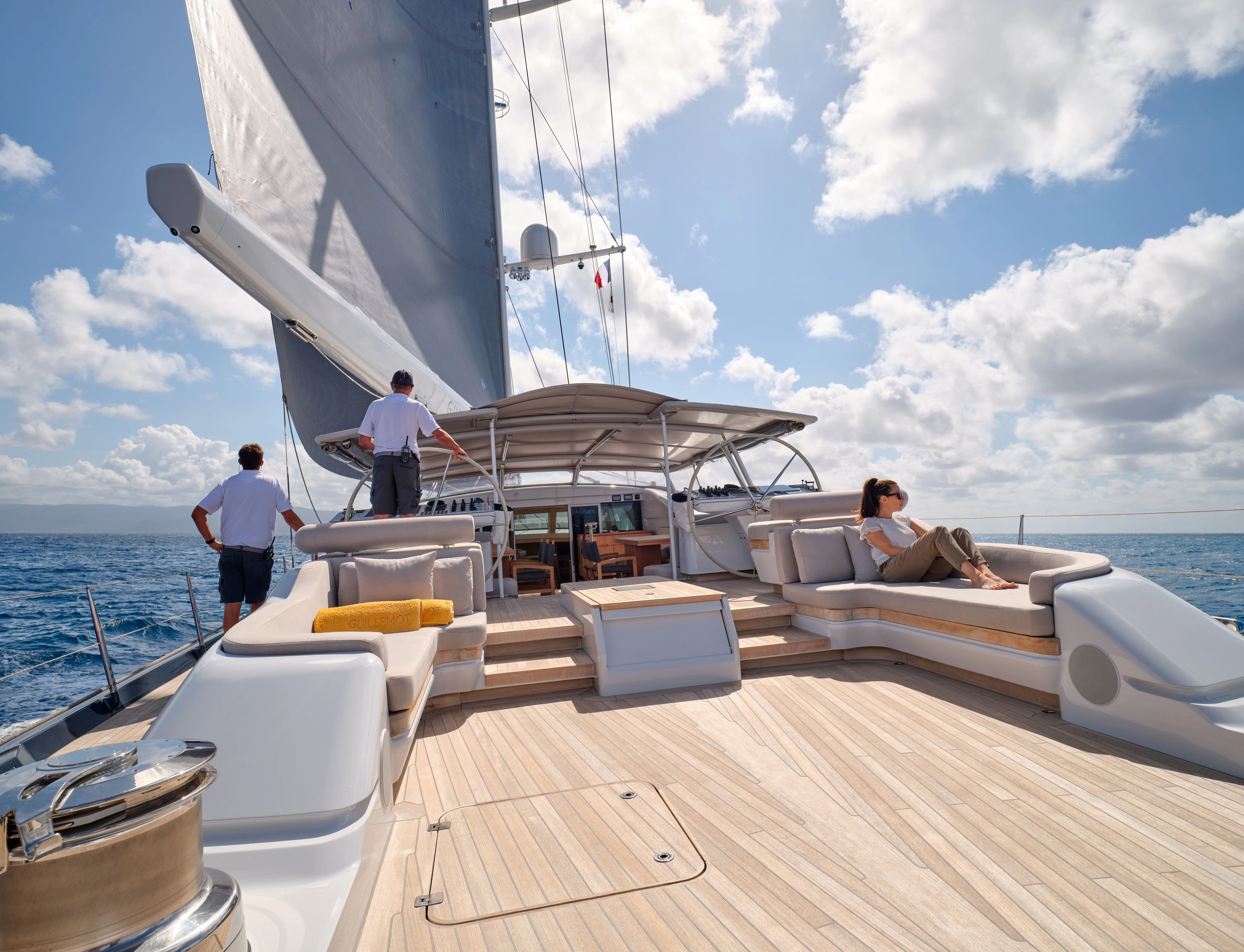 a group of people on a boat aboard GUILLEMOT Yacht for Charter