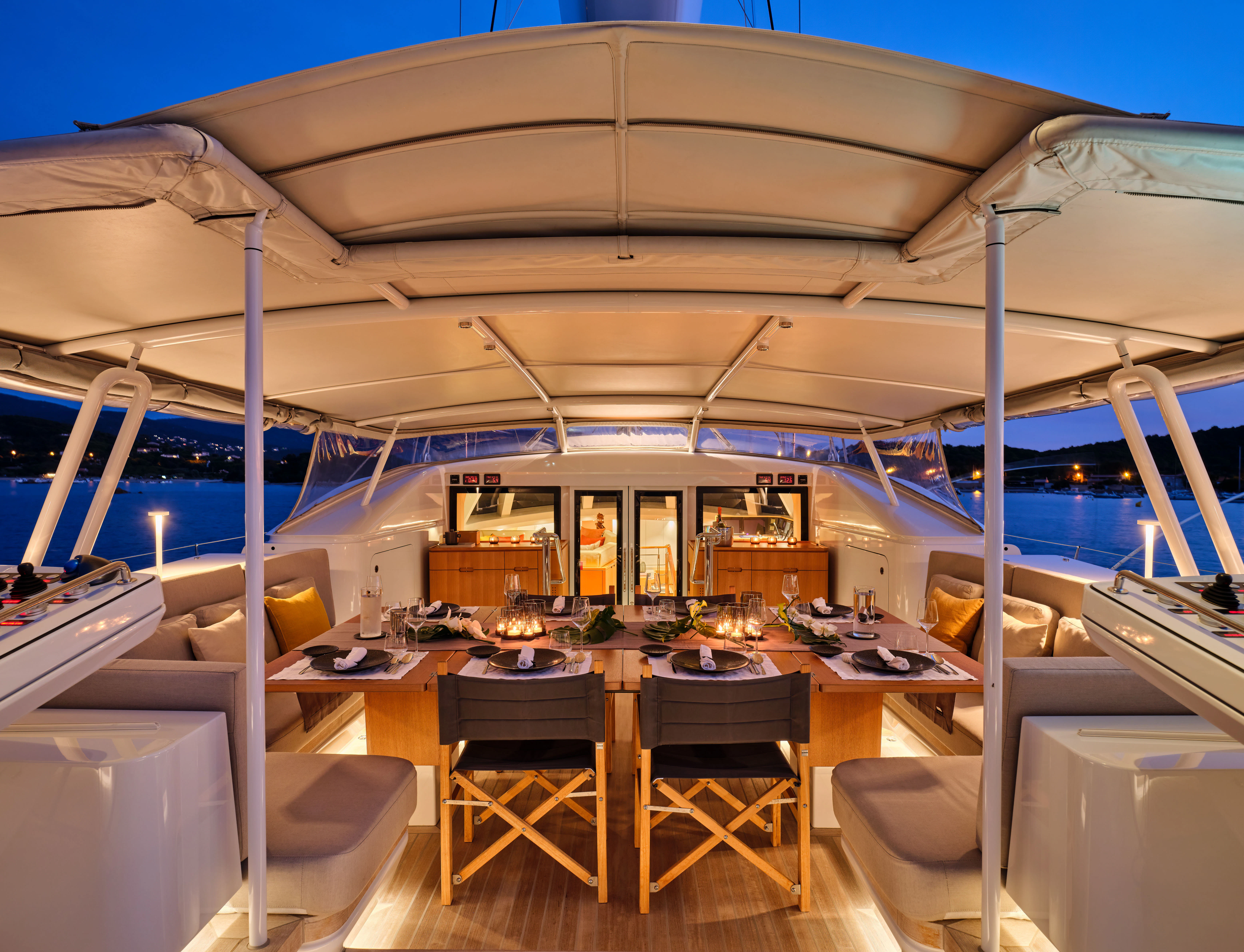 a restaurant with tables and chairs aboard GUILLEMOT Yacht for Charter