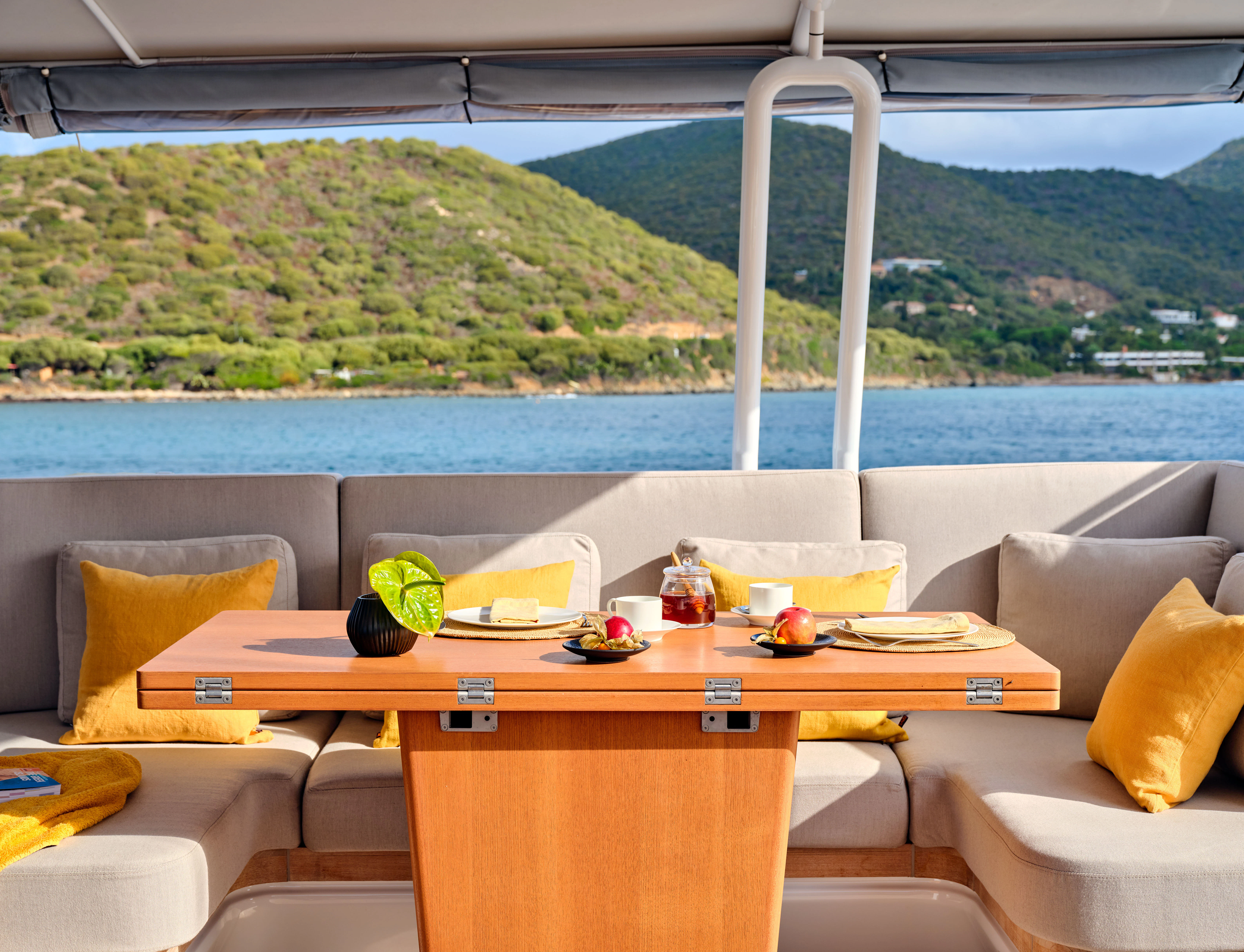 a table with food on it aboard GUILLEMOT Yacht for Charter