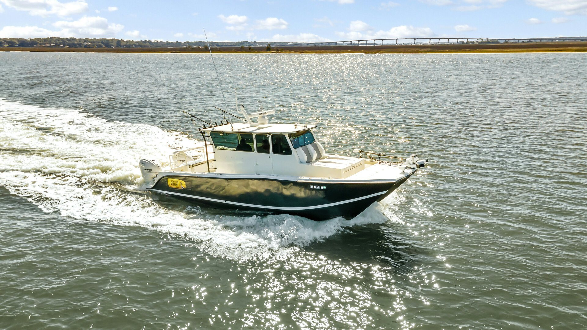 a boat on the water aboard HOLLOW POINT Yacht for Sale