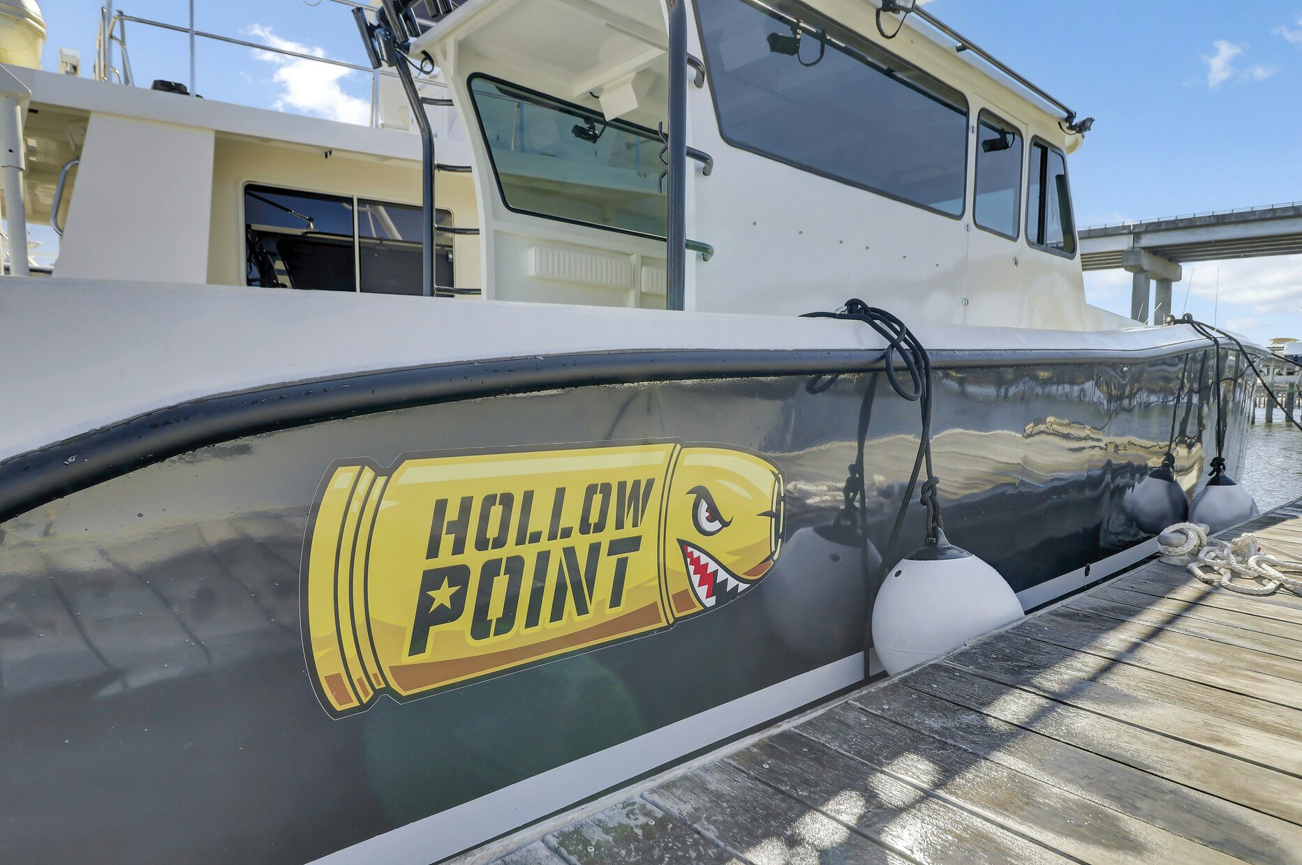 a boat on the water aboard OUR TRADE Yacht for Sale