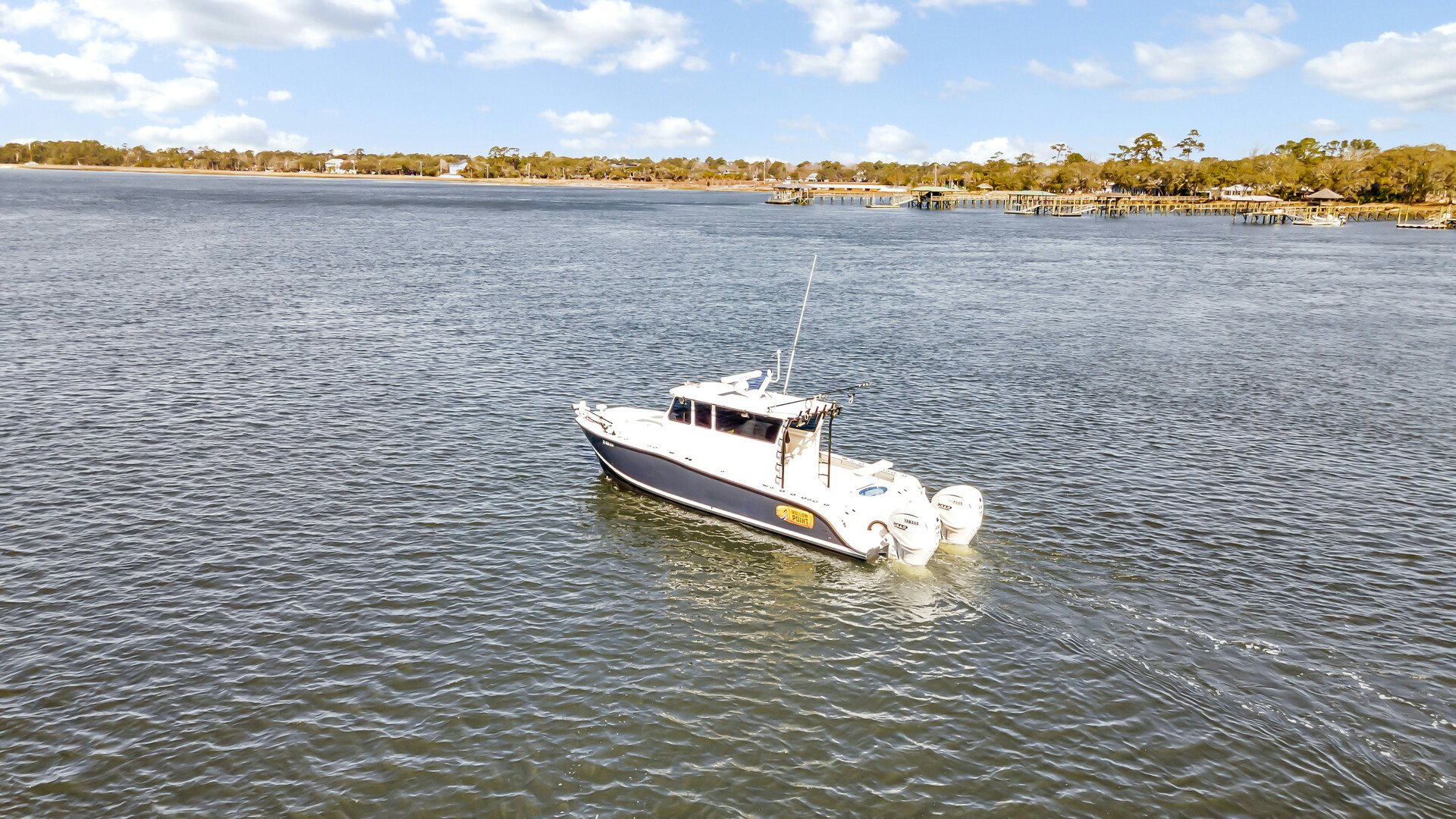 a boat in the water aboard OUR TRADE Yacht for Sale