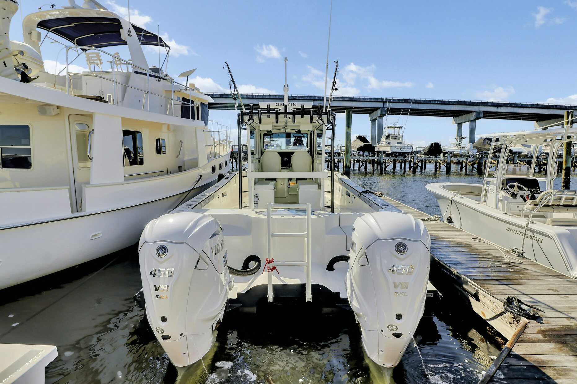 a group of boats are parked in a harbor aboard OUR TRADE Yacht for Sale