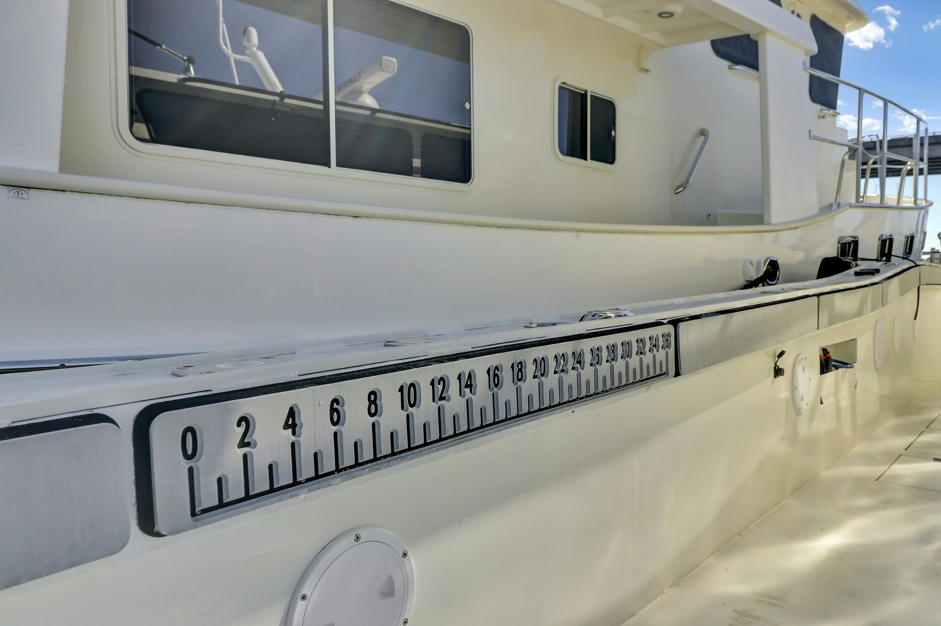 a close-up of a white vehicle aboard OUR TRADE Yacht for Sale