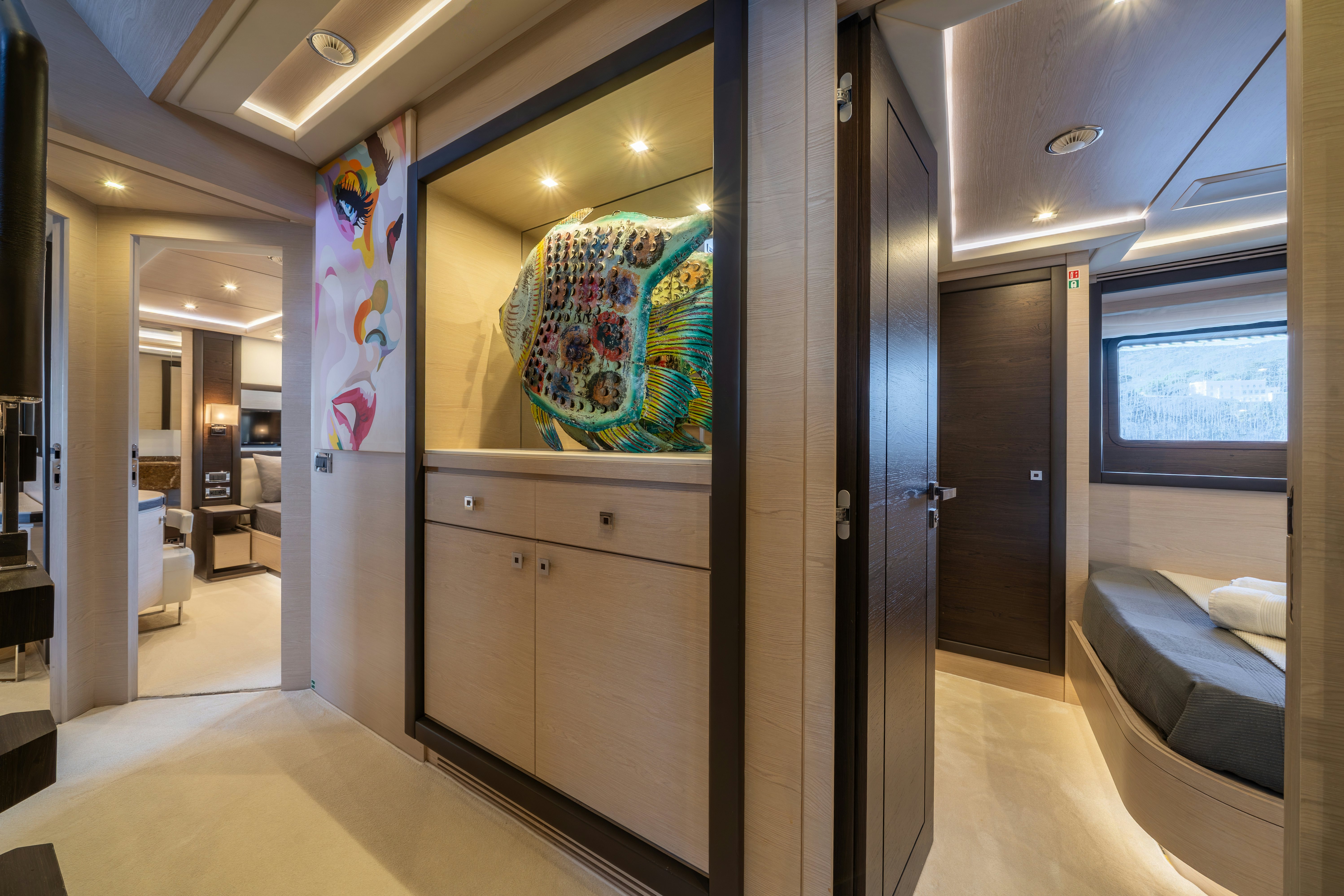 a room with a painting on the wall aboard HORIZON Yacht for Sale