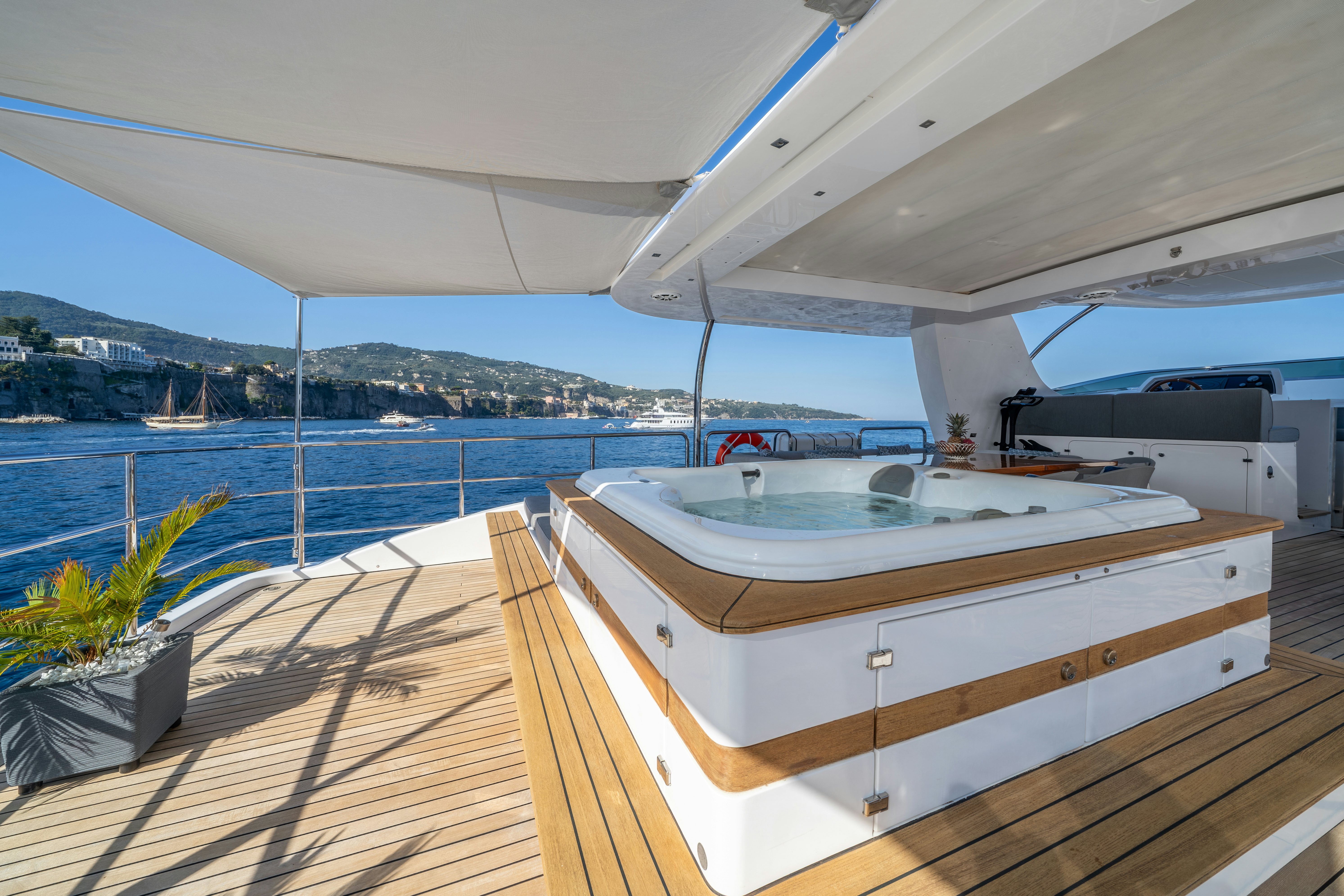 a boat on a deck aboard HORIZON Yacht for Sale