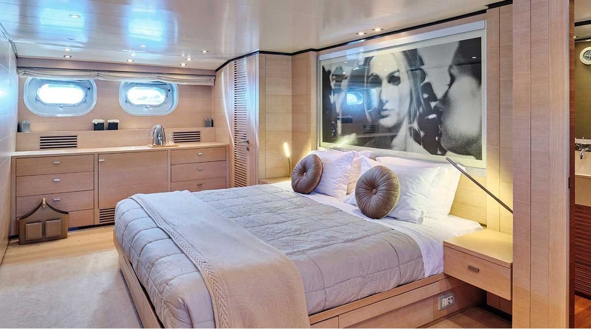 a bed in a room aboard AMICI PER SEMPRE Yacht for Charter