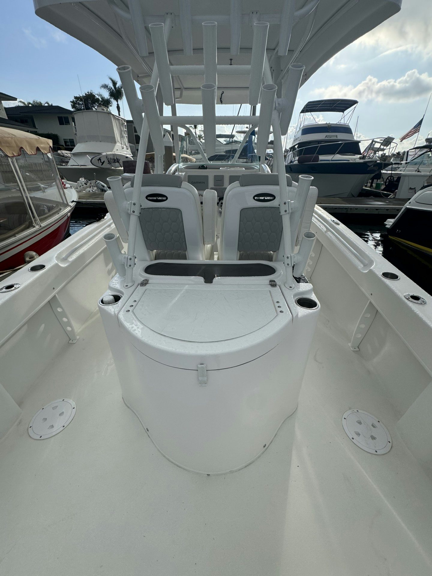 a boat parked in a harbor aboard TWIN VEE 26 Yacht for Sale