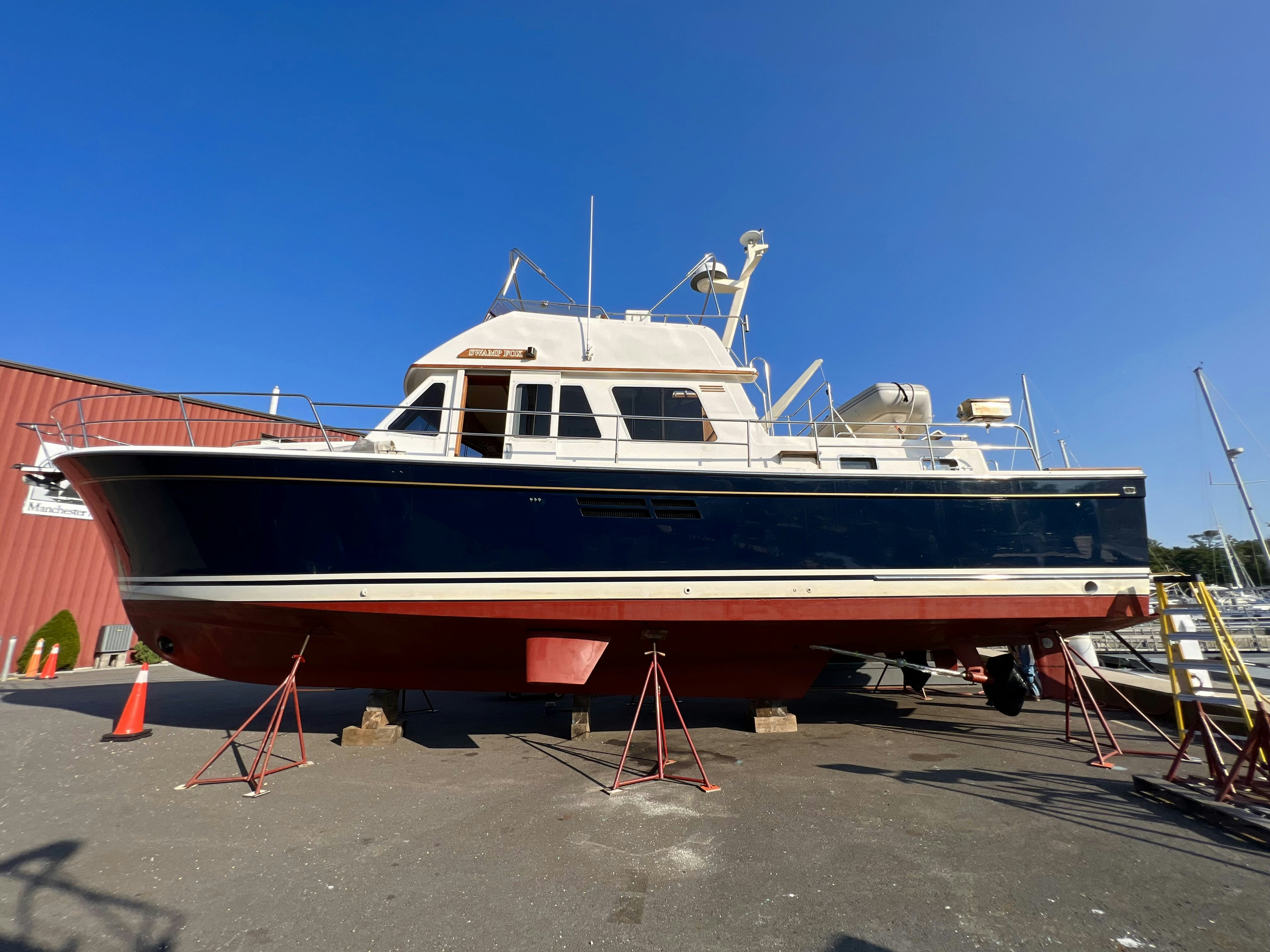 a boat on a trailer aboard SWAMP FOX Yacht for Sale