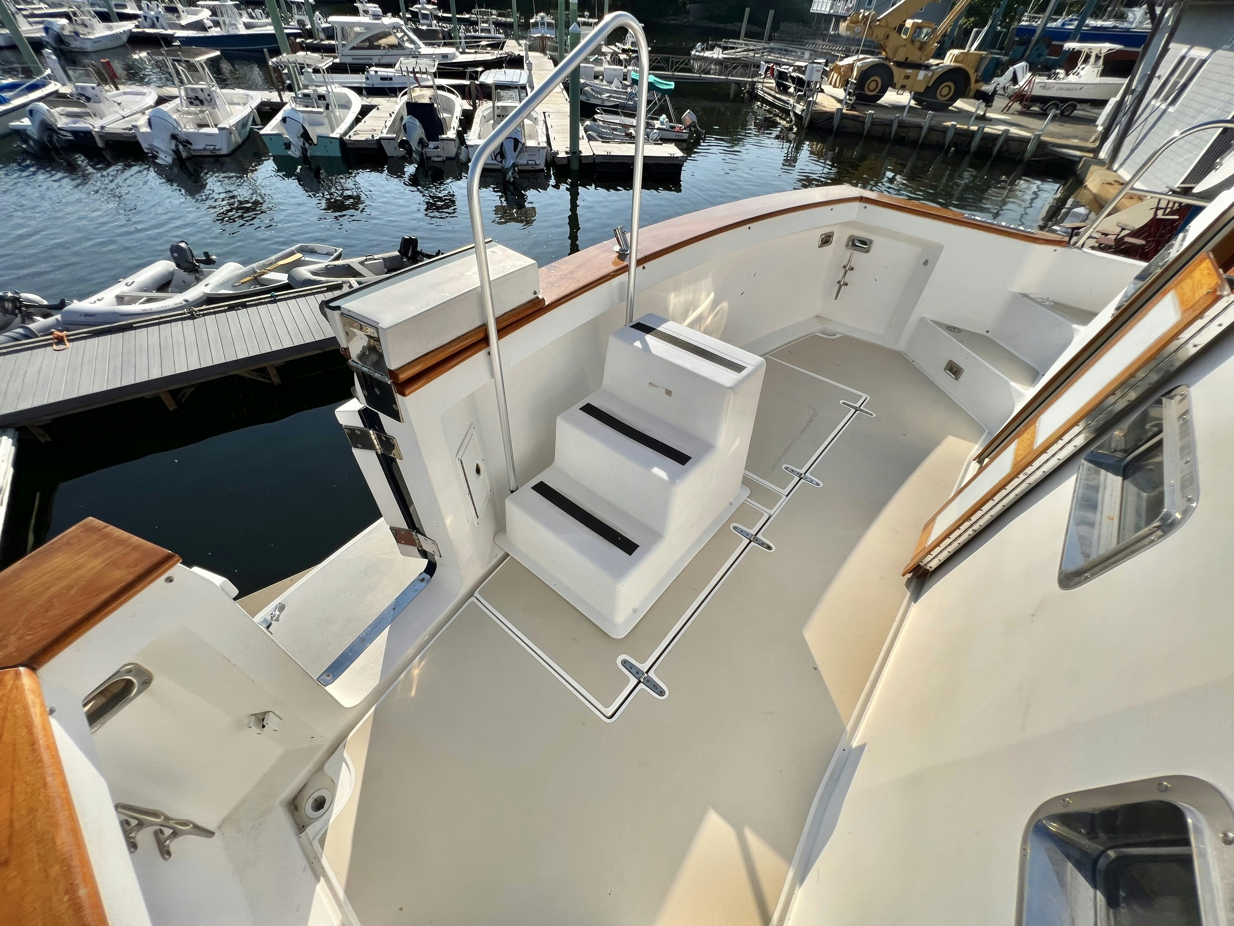 a boat in a harbor aboard SWAMP FOX Yacht for Sale