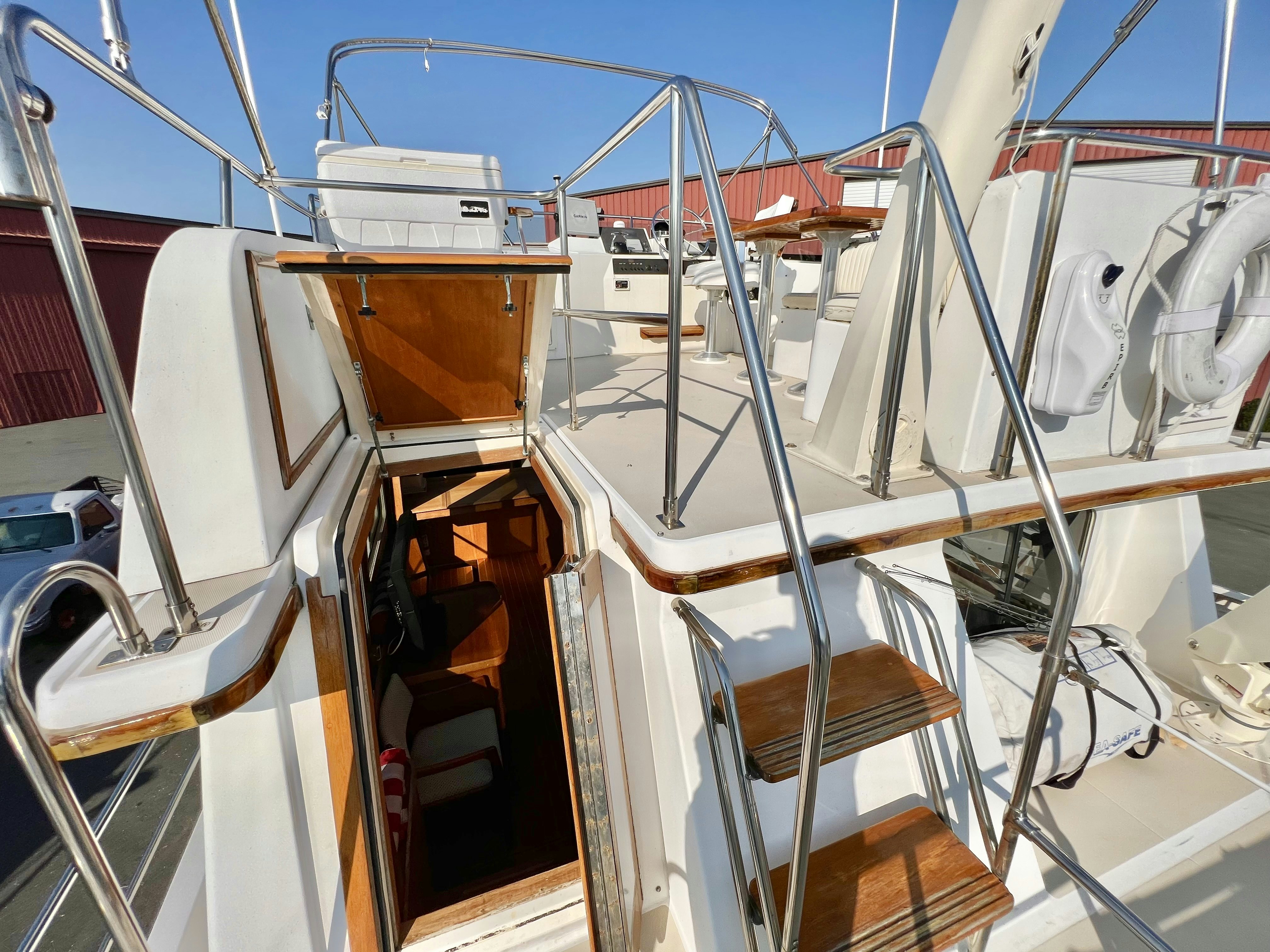 a large white boat with many ropes aboard SWAMP FOX Yacht for Sale