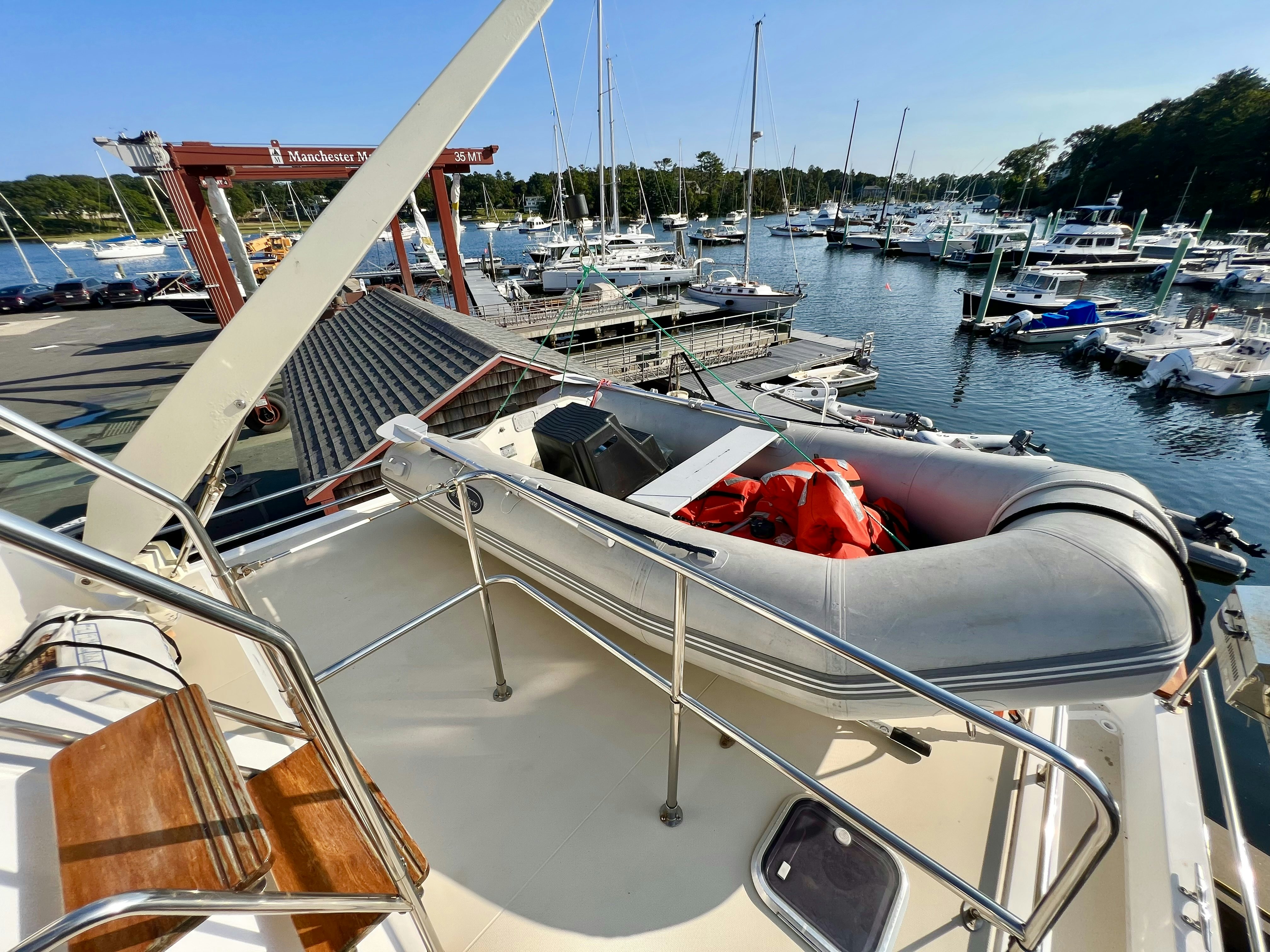 a boat with a red cloth on the front aboard SWAMP FOX Yacht for Sale