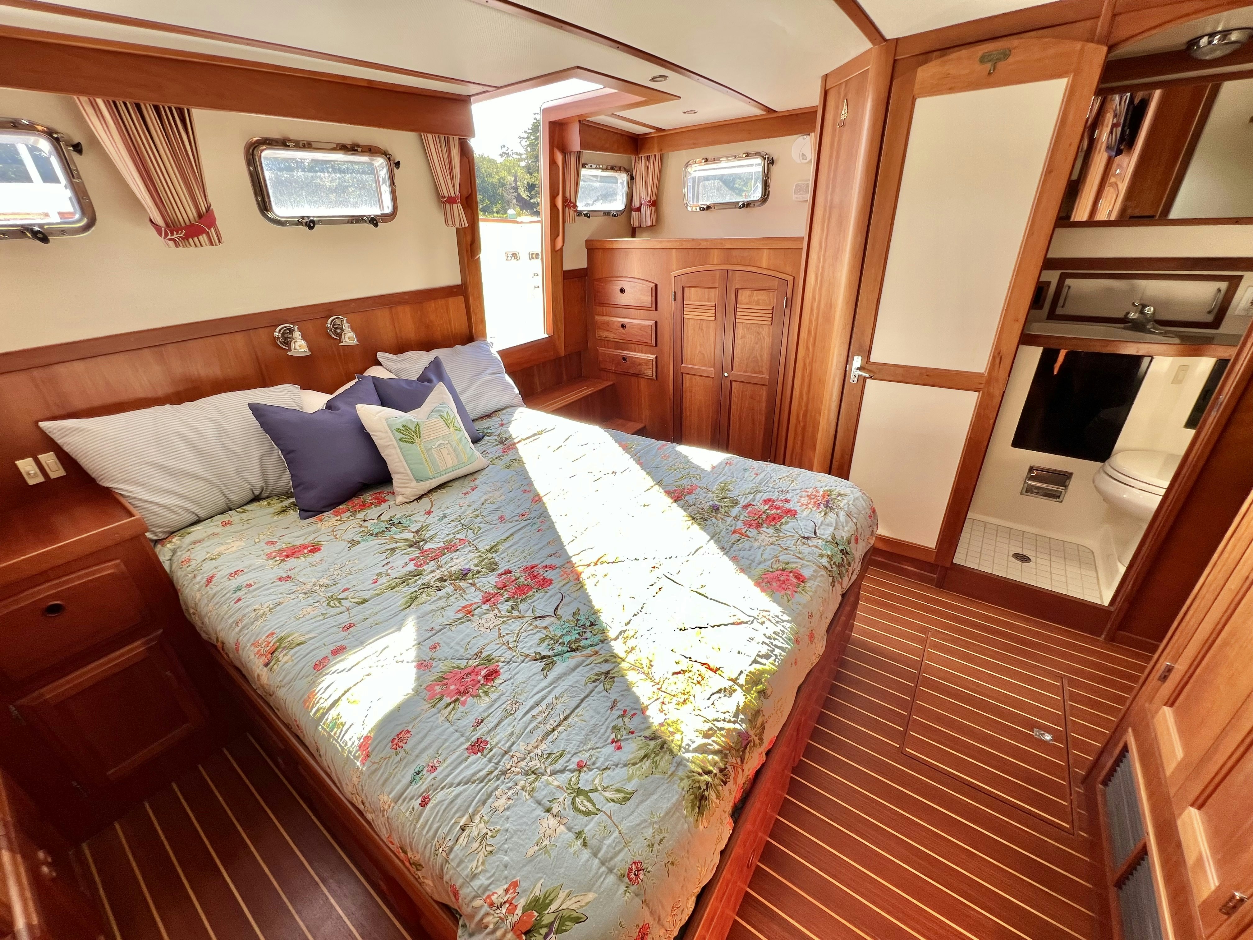 a bed in a room aboard SWAMP FOX Yacht for Sale