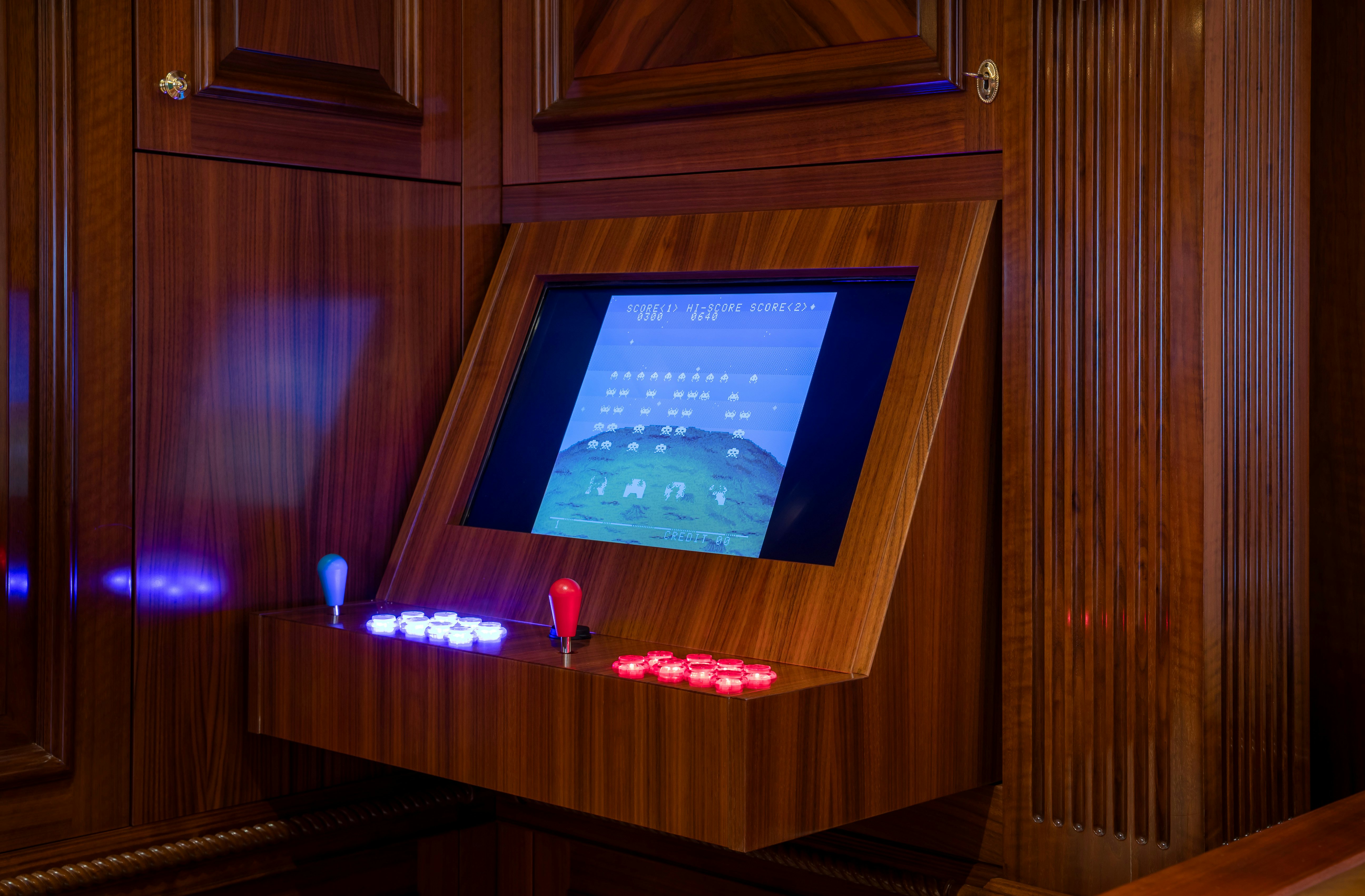 a television on a stand aboard STARFIRE Yacht for Charter