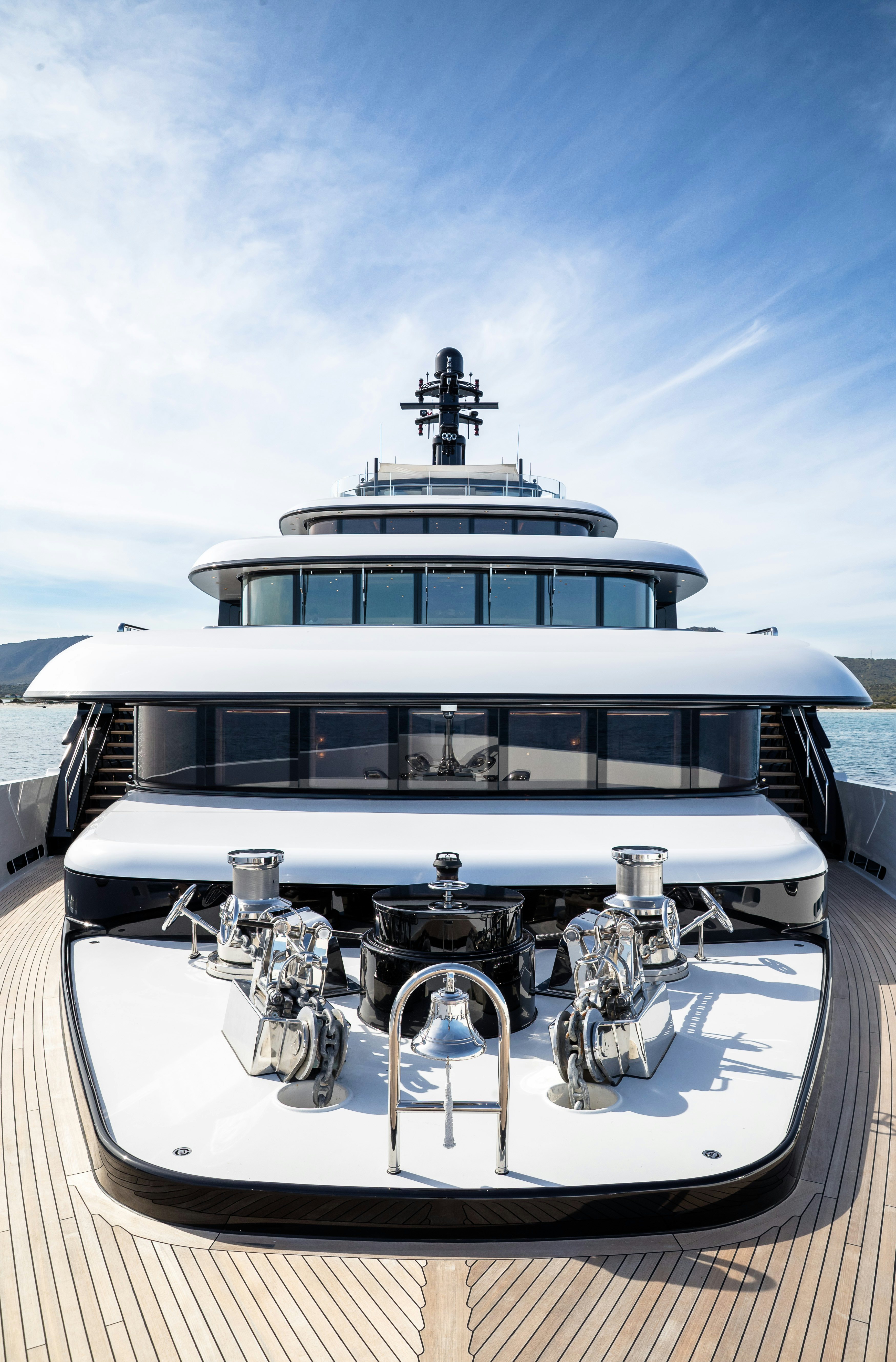 a white boat with a cross on the front aboard STARFIRE Yacht for Charter