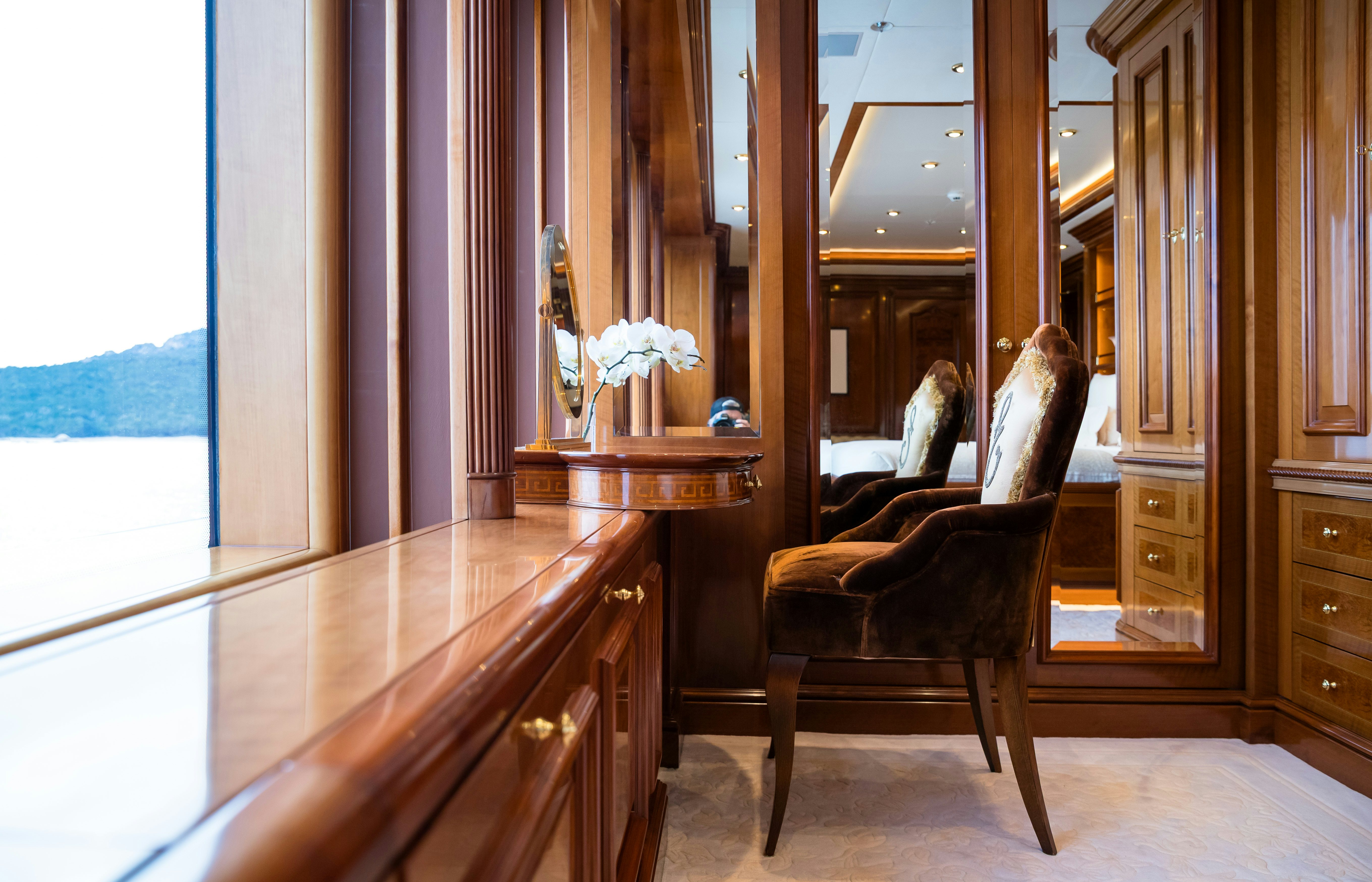 a chair in a room aboard STARFIRE Yacht for Charter