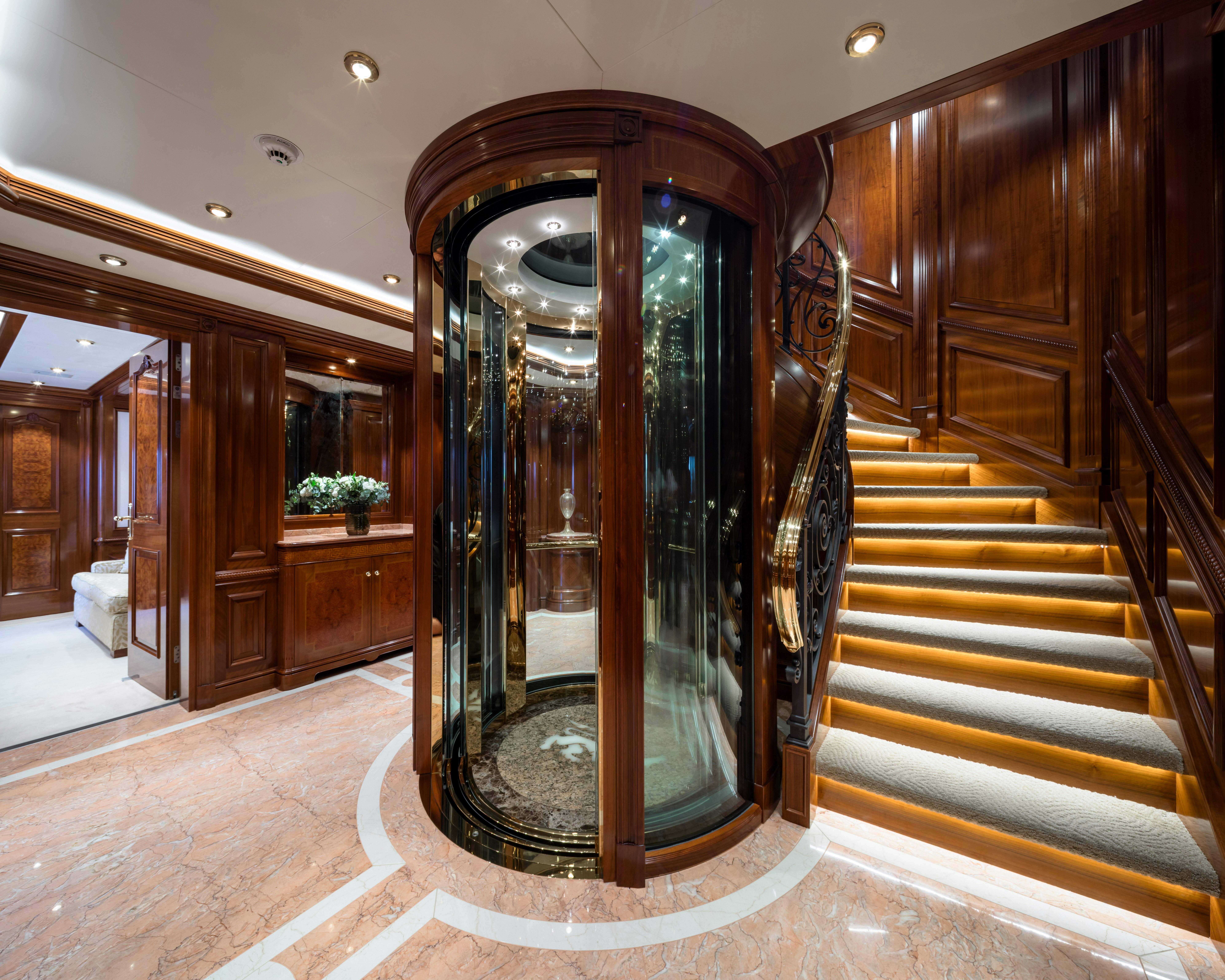 a large glass door in a room aboard STARFIRE Yacht for Charter