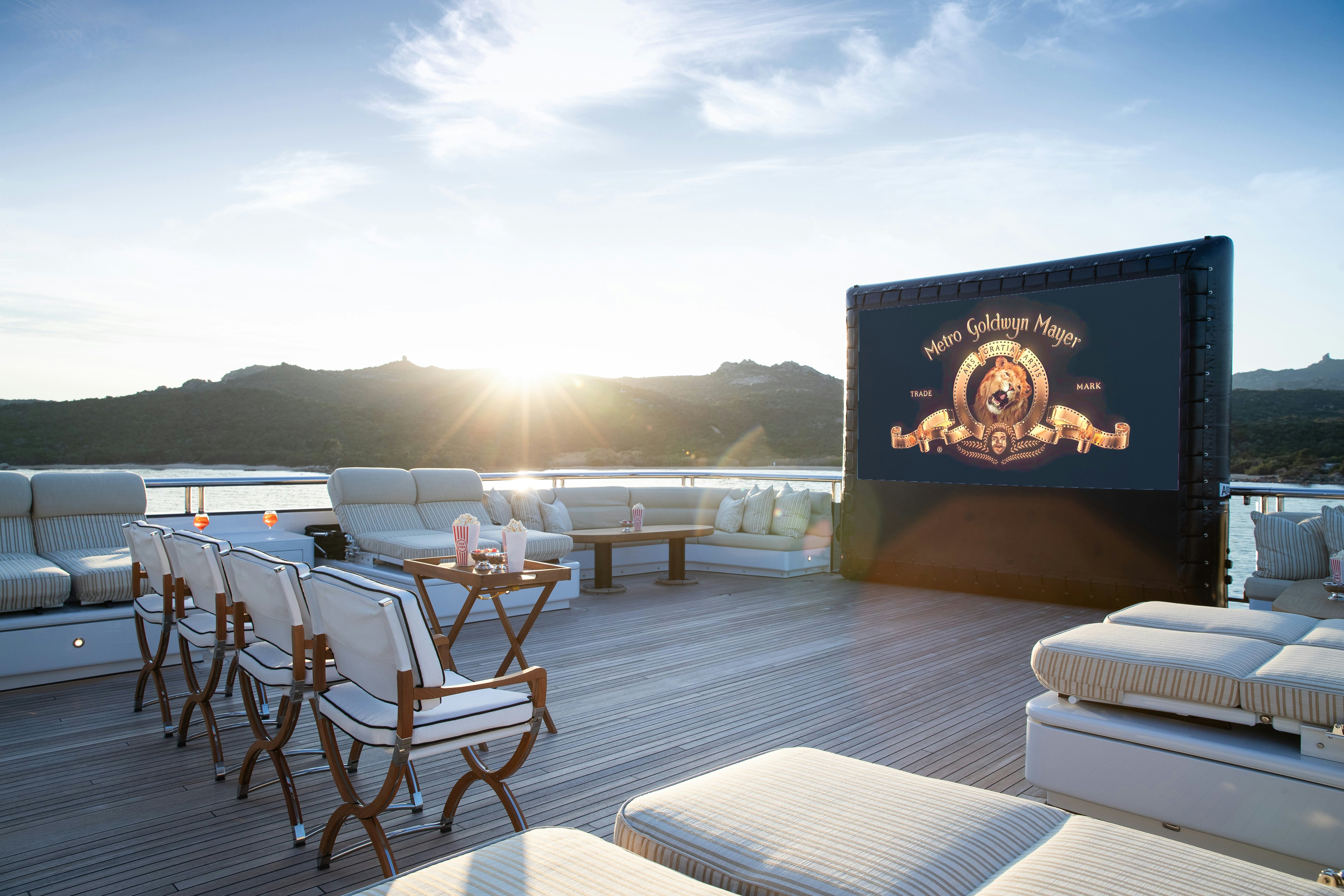 a large screen on a deck aboard STARFIRE Yacht for Charter