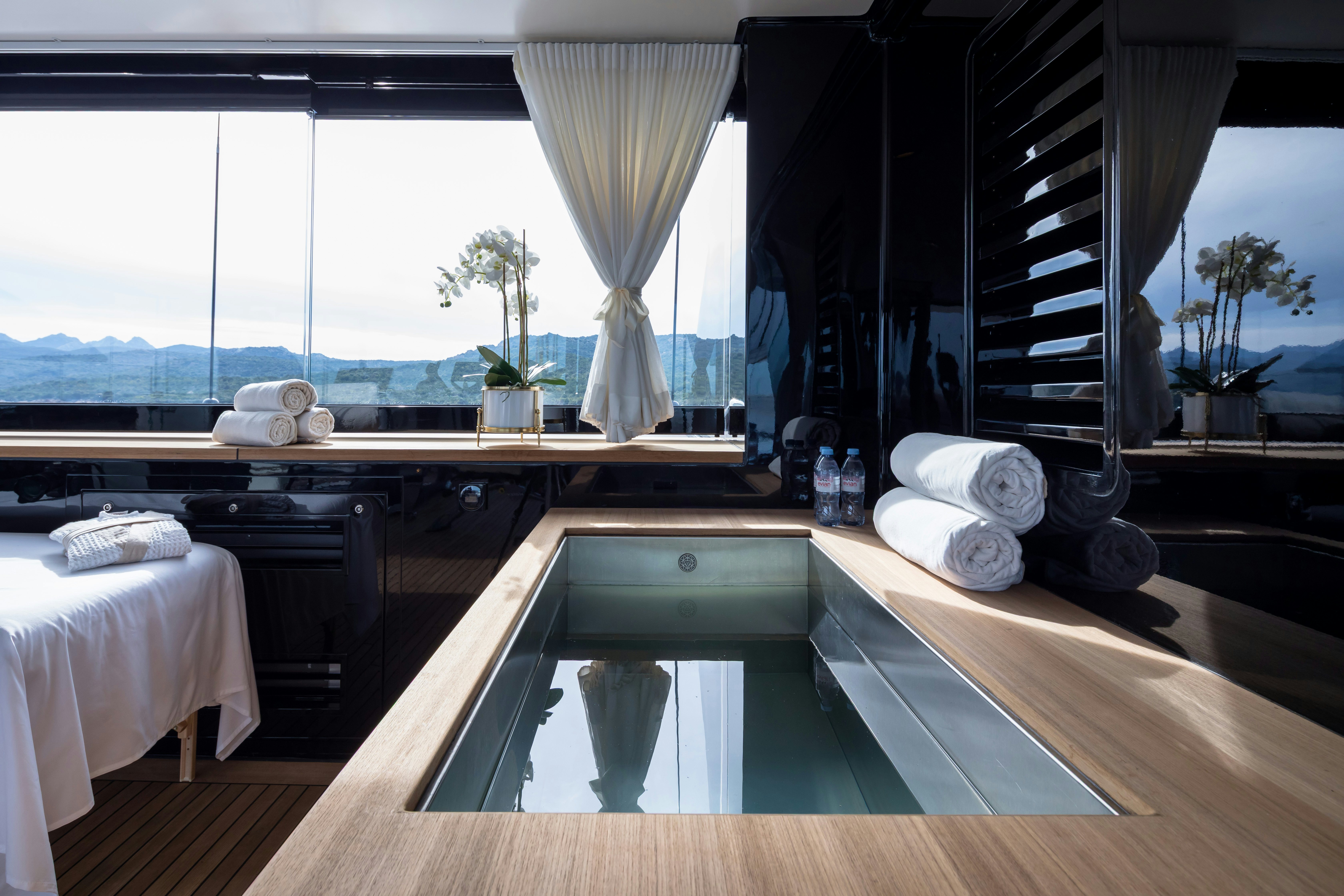 a room with a large window aboard STARFIRE Yacht for Charter