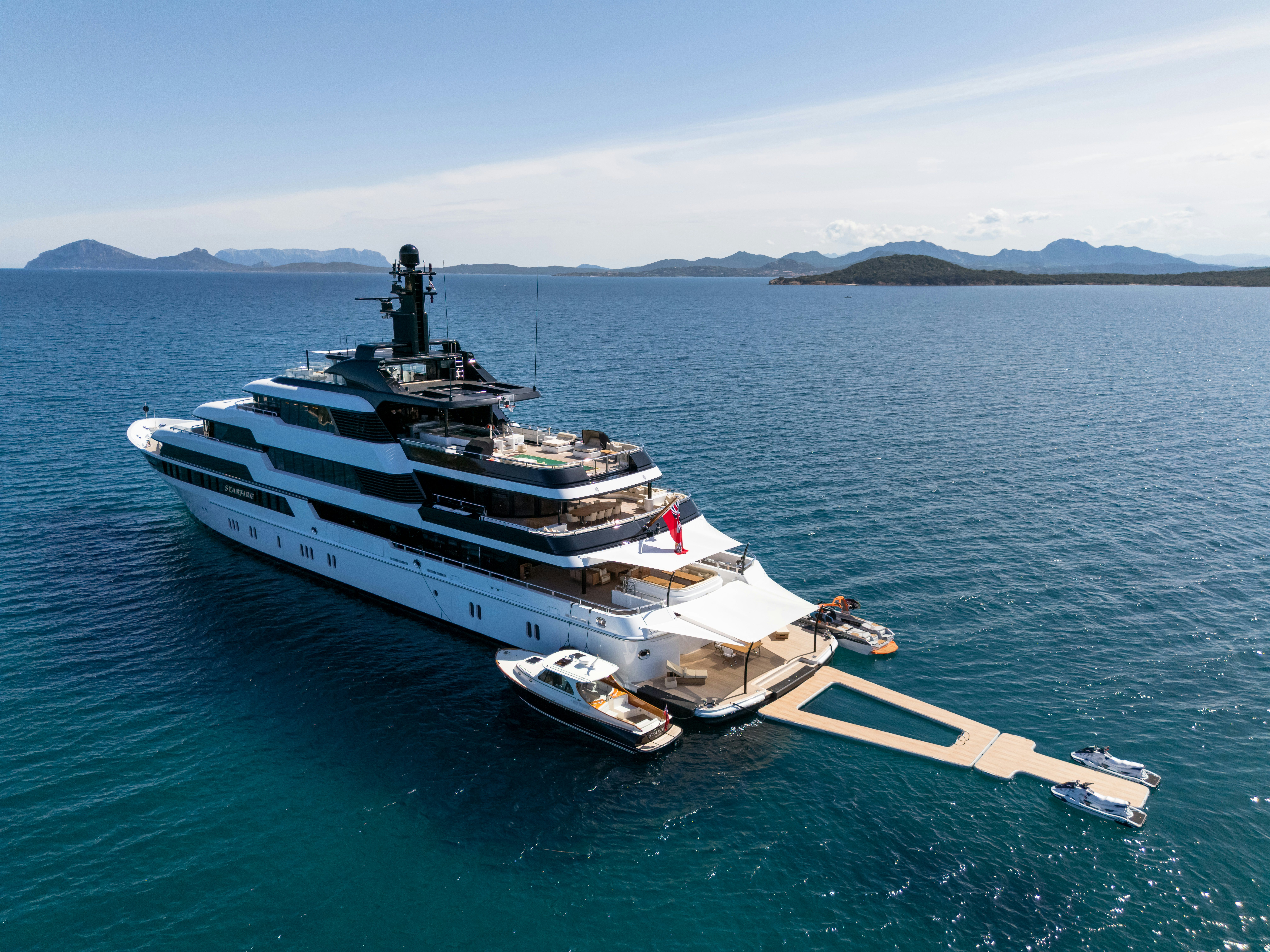 a large ship in the water aboard STARFIRE Yacht for Charter