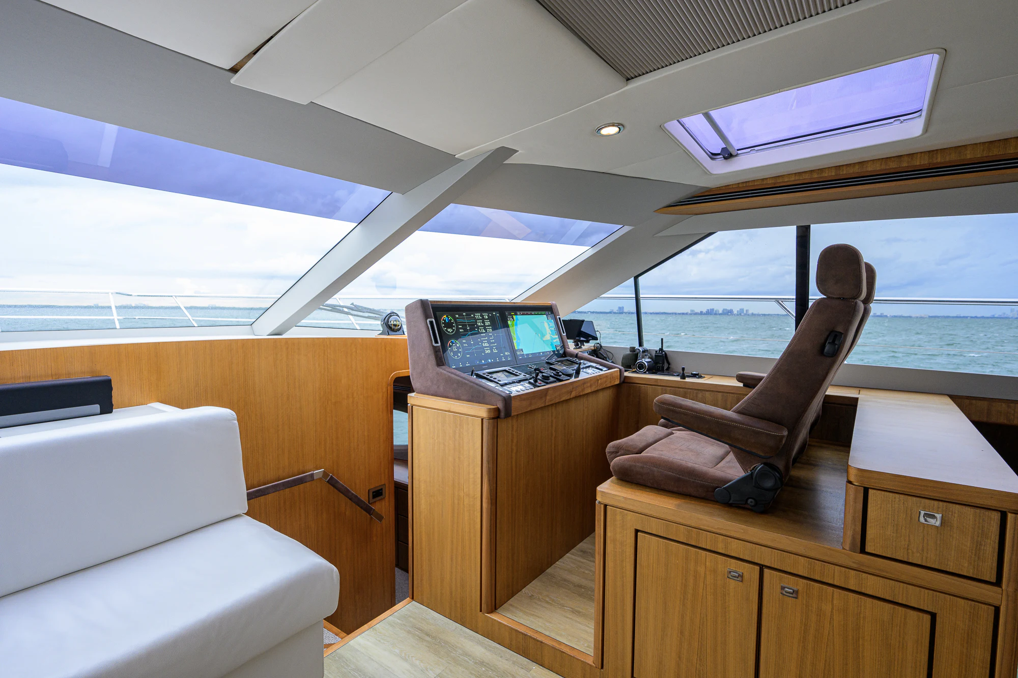 a boat with a desk and a laptop on it aboard TURQUOISE Yacht for Sale