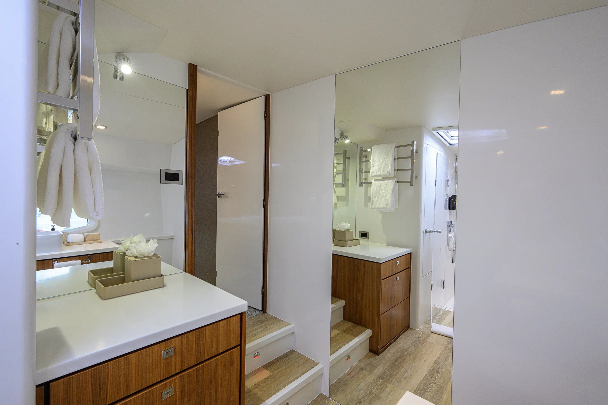 a bathroom with a large mirror aboard TURQUOISE Yacht for Sale