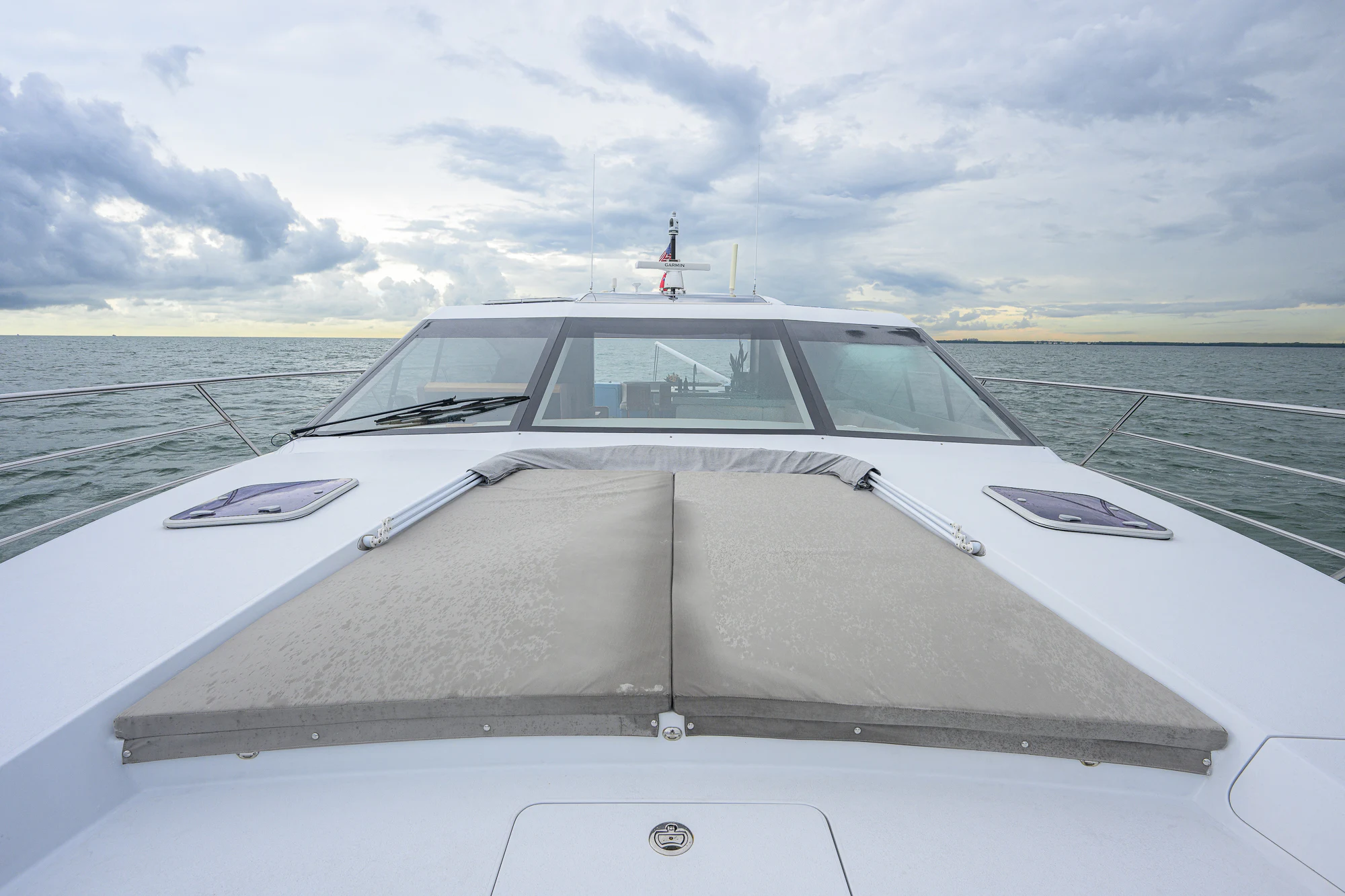 a white car on a boat aboard TURQUOISE Yacht for Sale