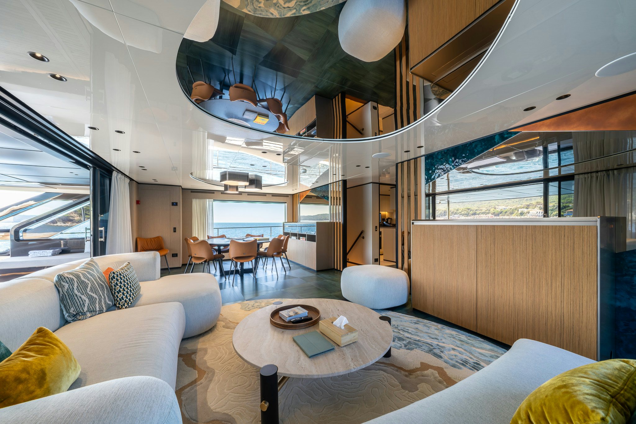 a living room with a large window aboard ACALI Yacht for Sale