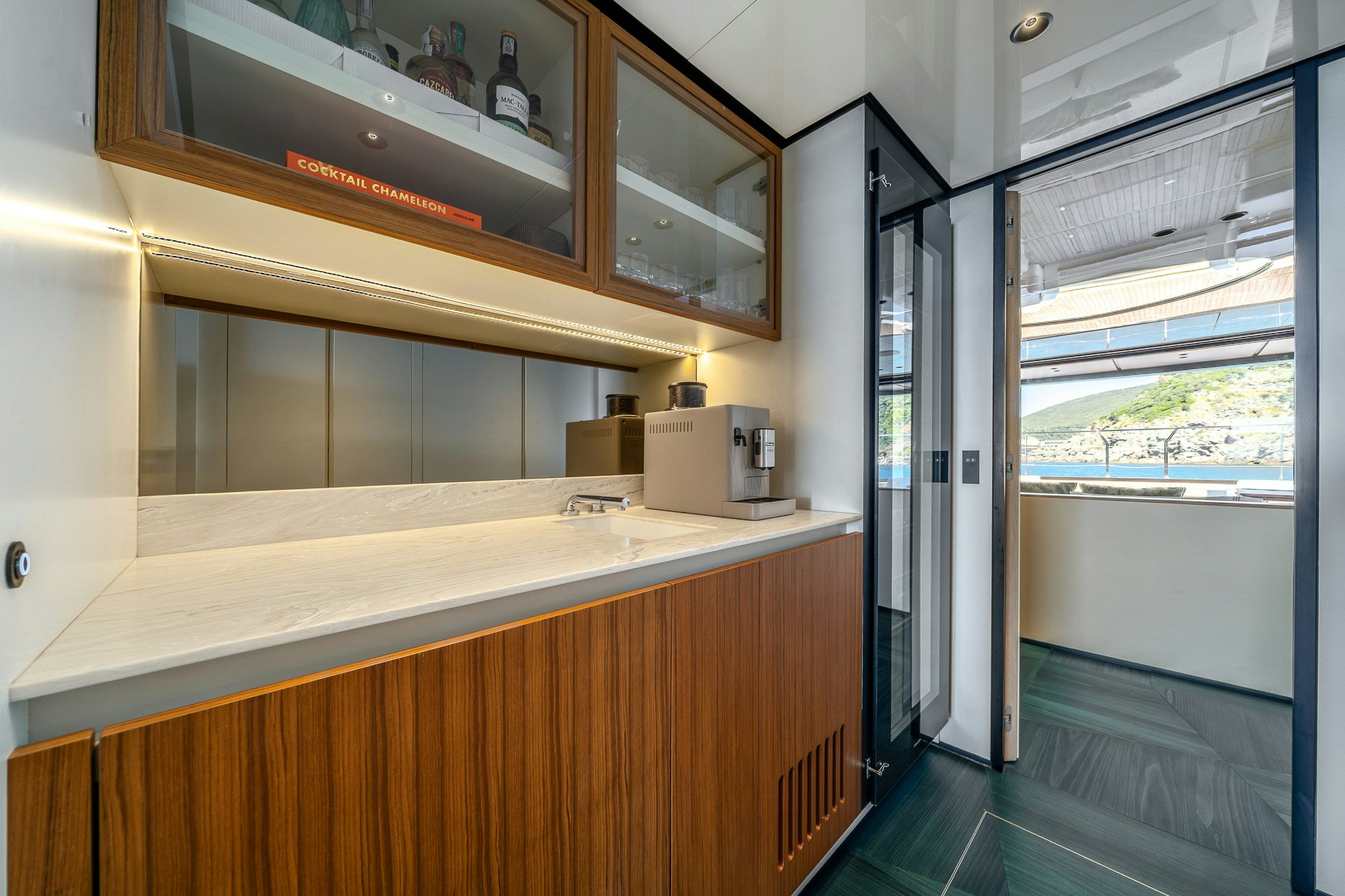 a kitchen with a window and a sink aboard ACALI Yacht for Sale