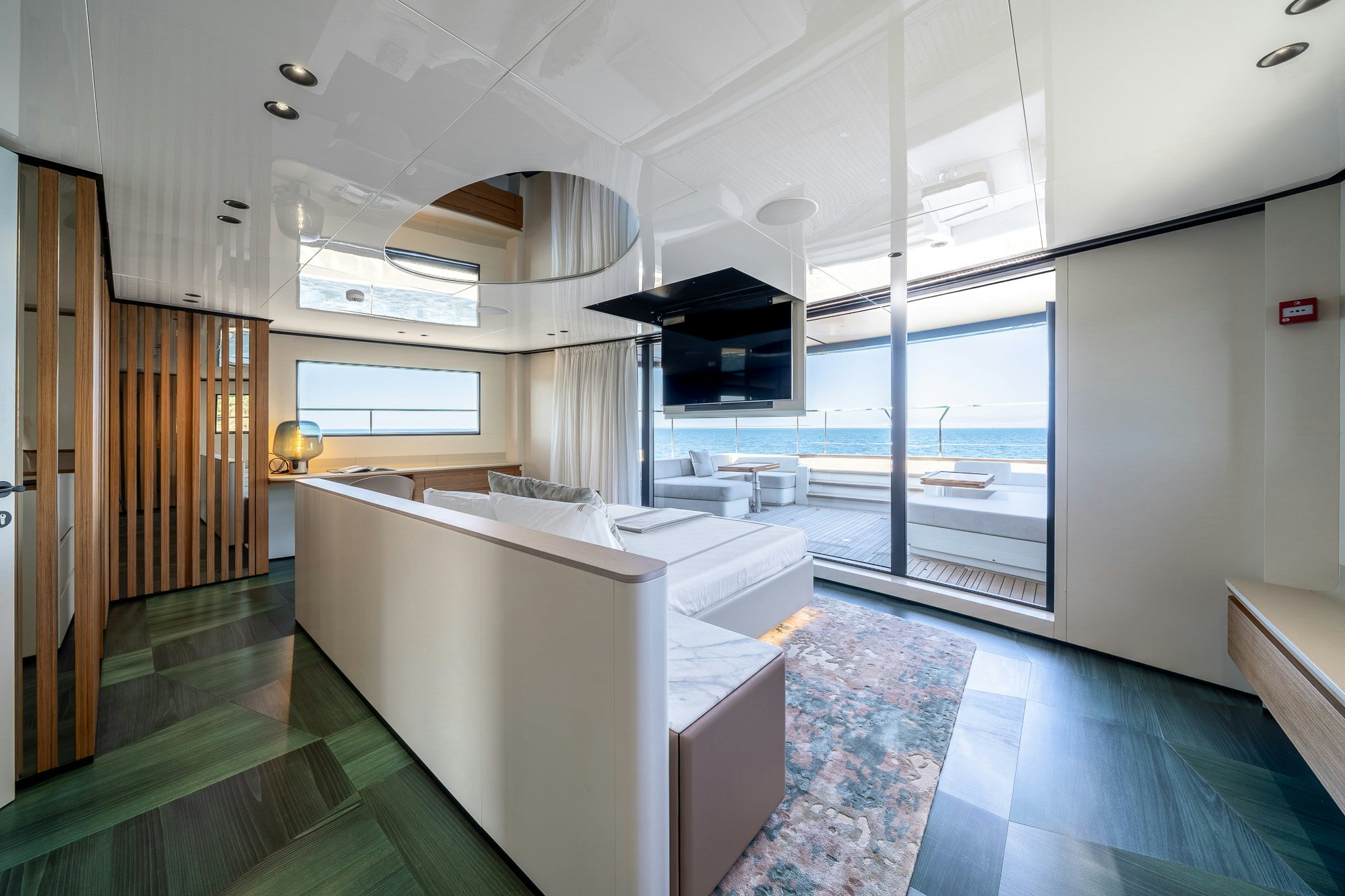 a room with a large window and a view of the ocean aboard ACALI Yacht for Sale
