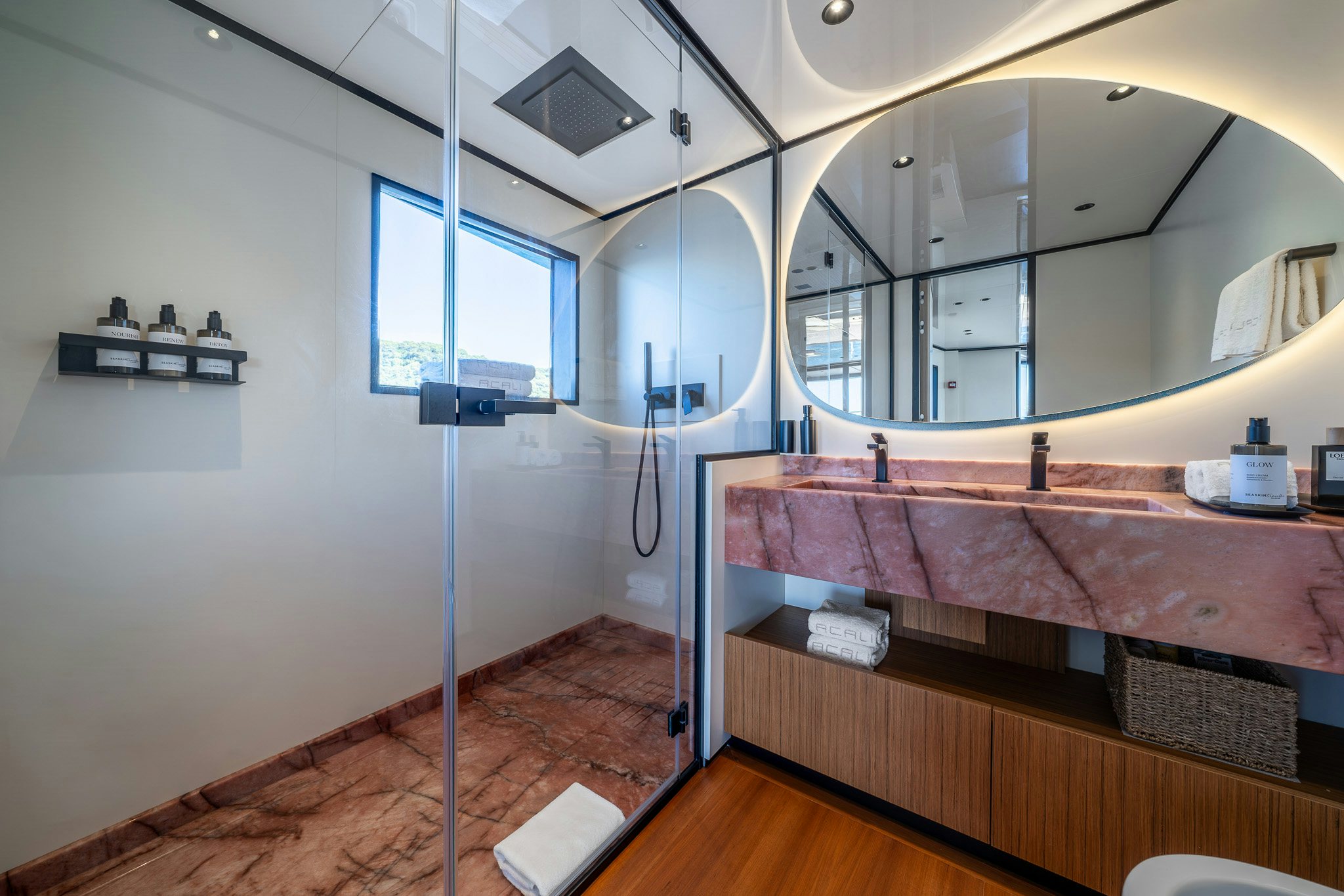 a room with a mirror and a bed aboard ACALI Yacht for Sale