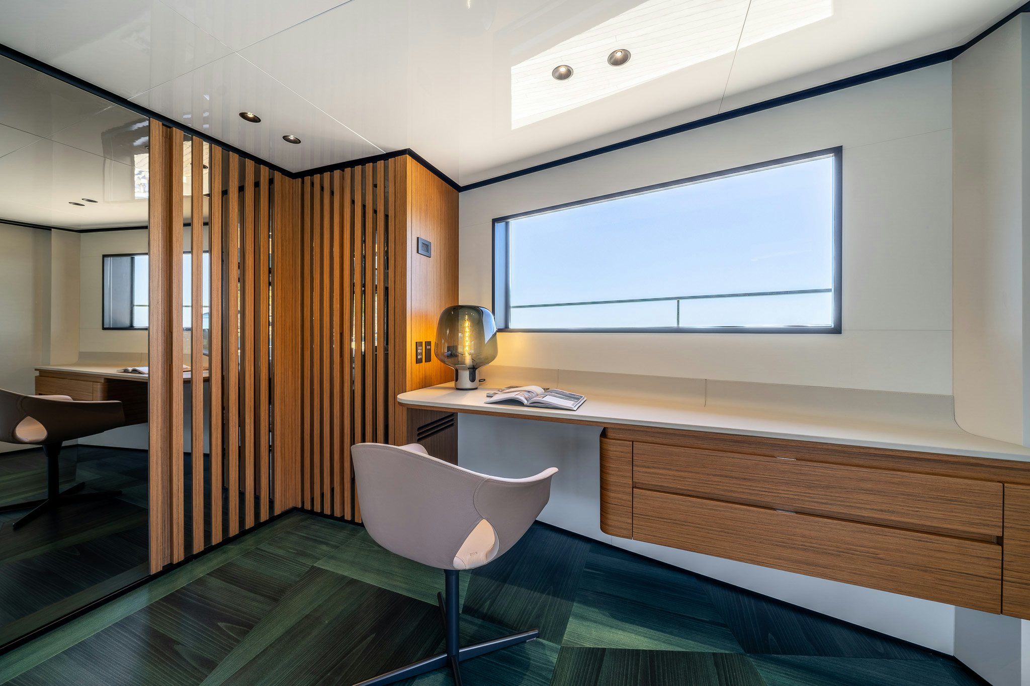 a room with a desk and a chair aboard ACALI Yacht for Sale