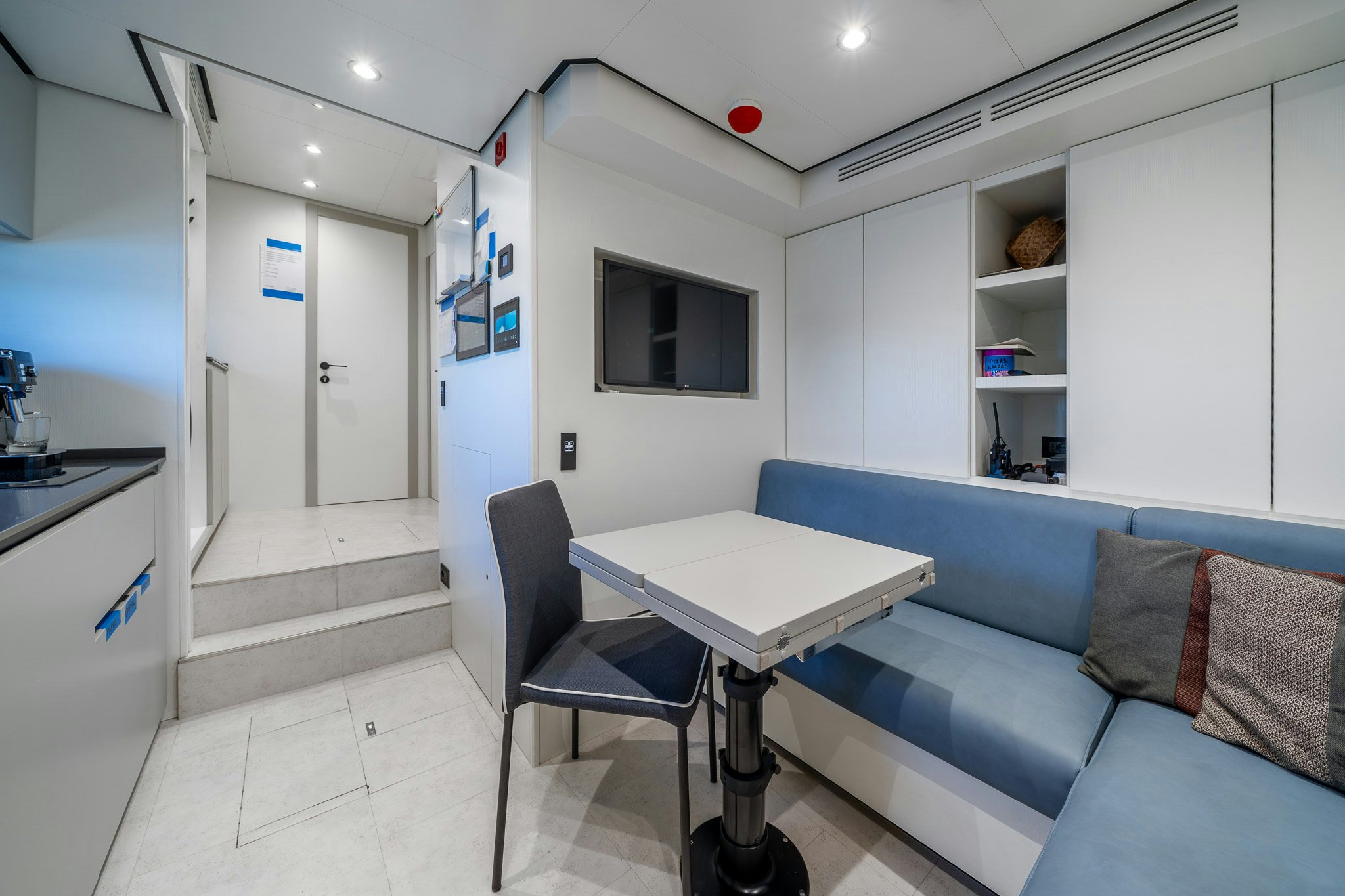 a kitchen and living room aboard ACALI Yacht for Sale